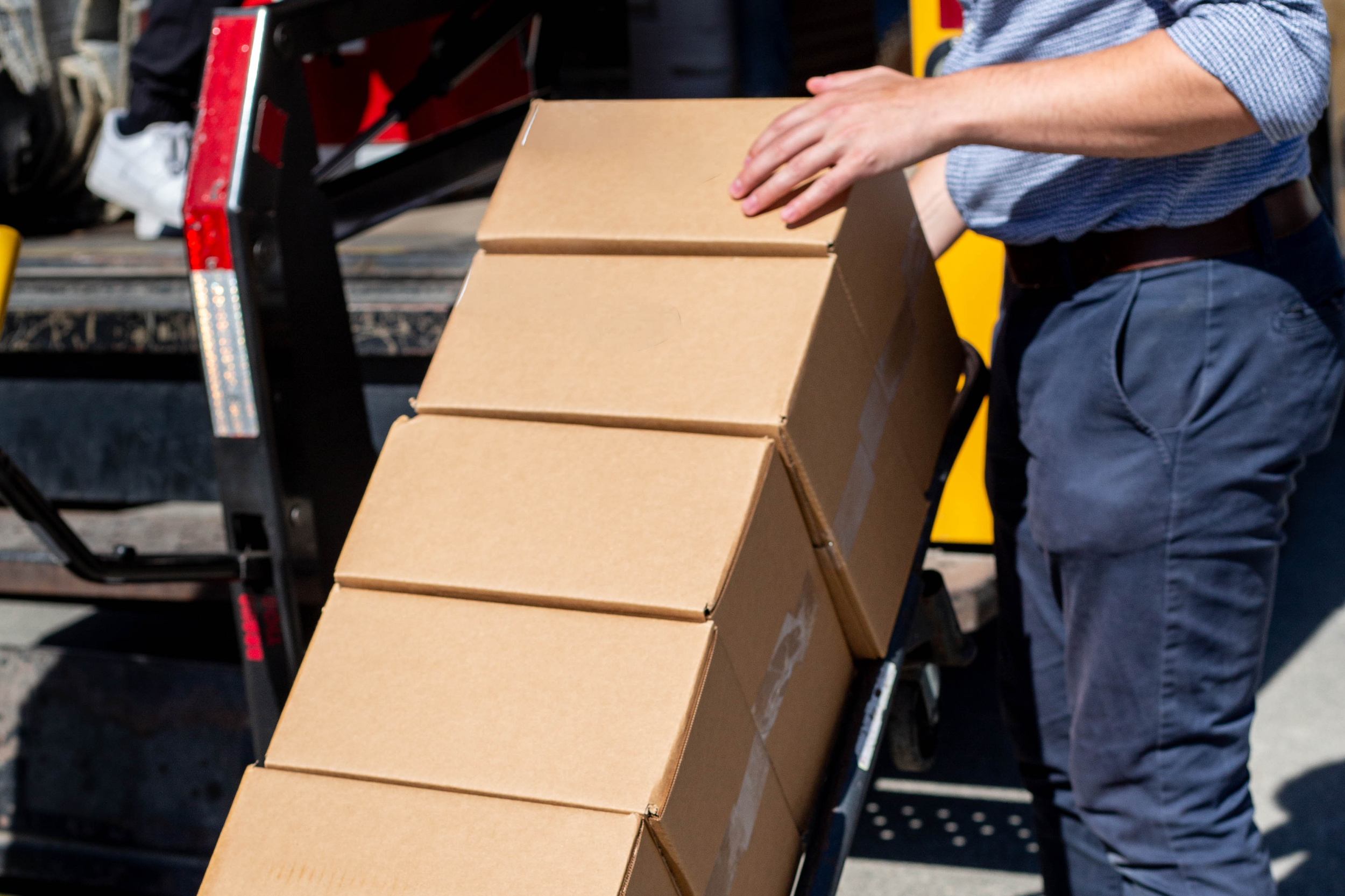 local food delivery packaged in brown boxes
