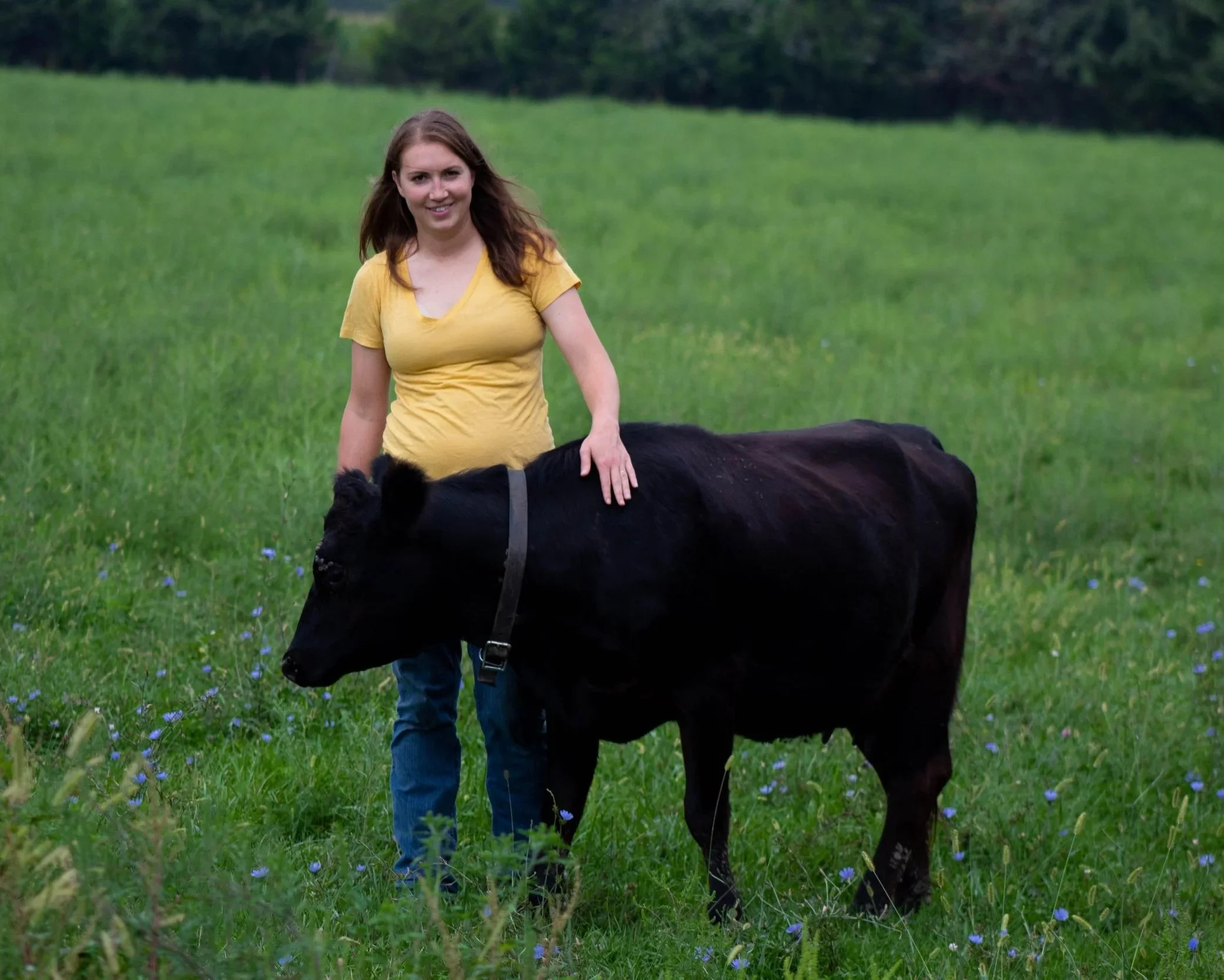 A local farmer with a cow