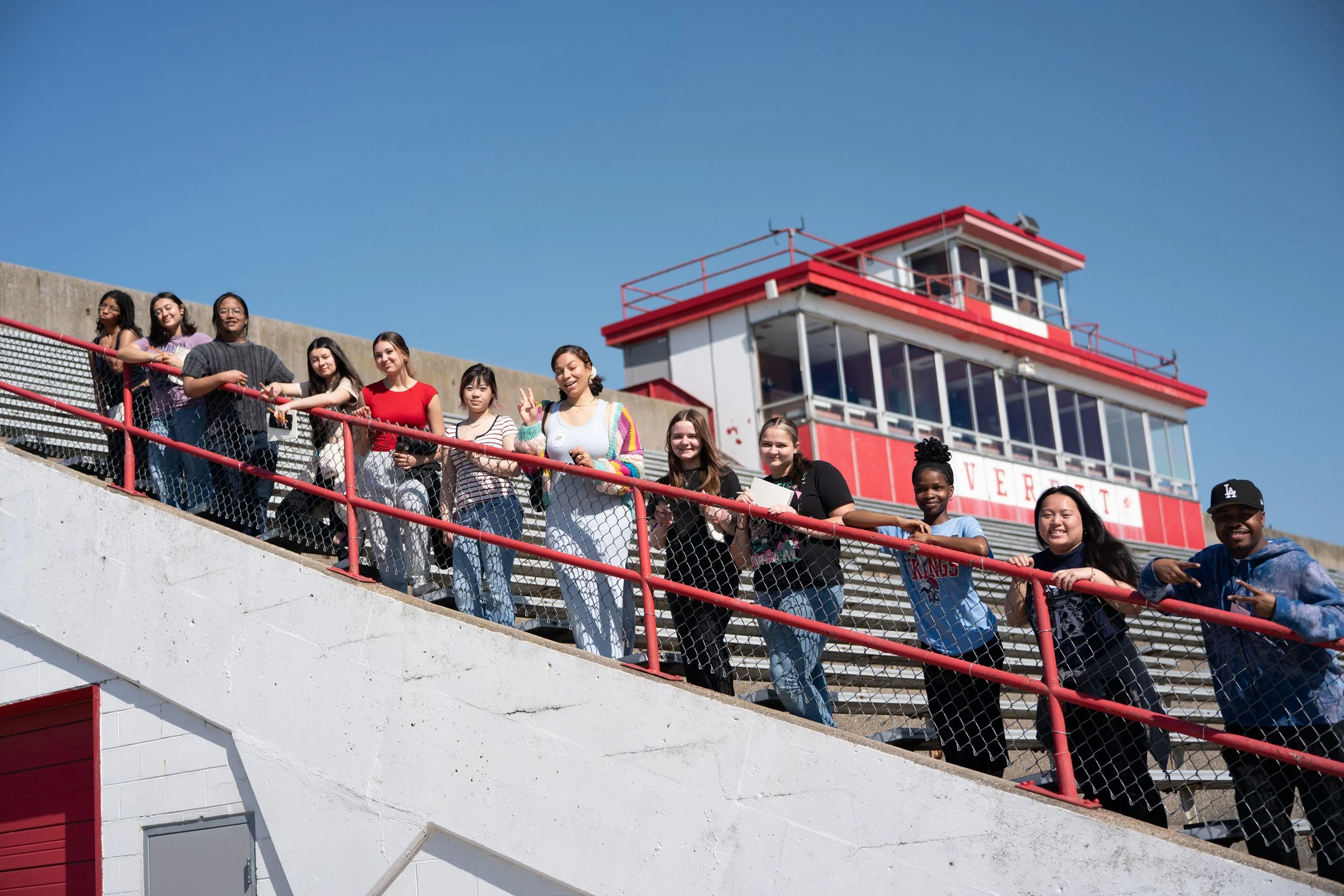 Students of the Everett High School mural workshop with lead instructor Mila Lynn (middle) and workshop assistant Jared Autrey (right).