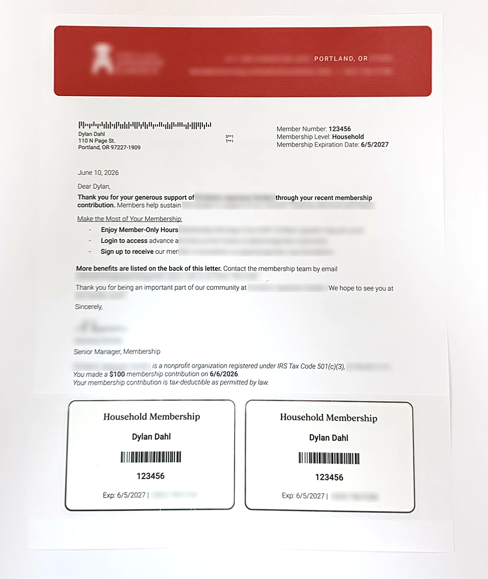 An example showing the Nonprofit letter with live data digitally printed on custom letter stock with sensative information blurred