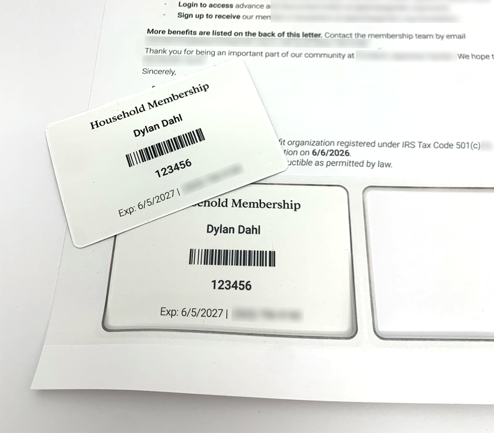 An example showing the Nonprofit membership cards with live data digitally printed on custom letter stock with sensative information blurred