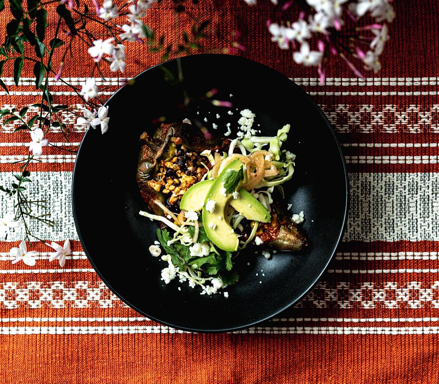 Stuffed Poblano Peppers.
-cut your peppers either in half or lay them on their side and just cut off enough to open them up, kind of like adding a moon roof.
**before you do this you can also char them over open flame on your gas grill to blister the