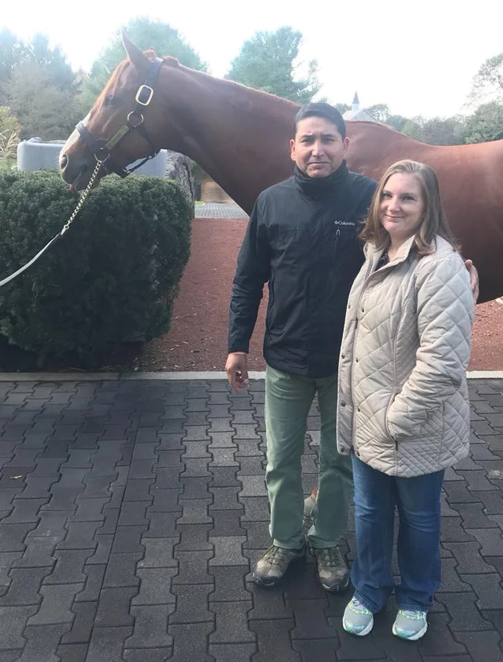 Hannah and Esteban with triple crown winner Justify