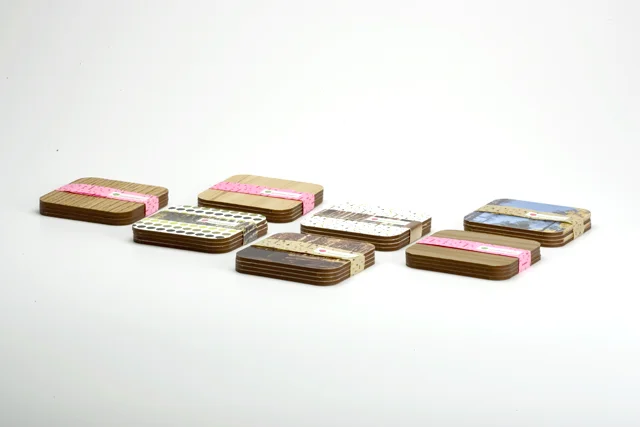 N A T U R E 0 4 / Elizabeth Azen. 2005. Coasters, various sets. MDF, woodgrain contact paper, digital prints, adhesive.