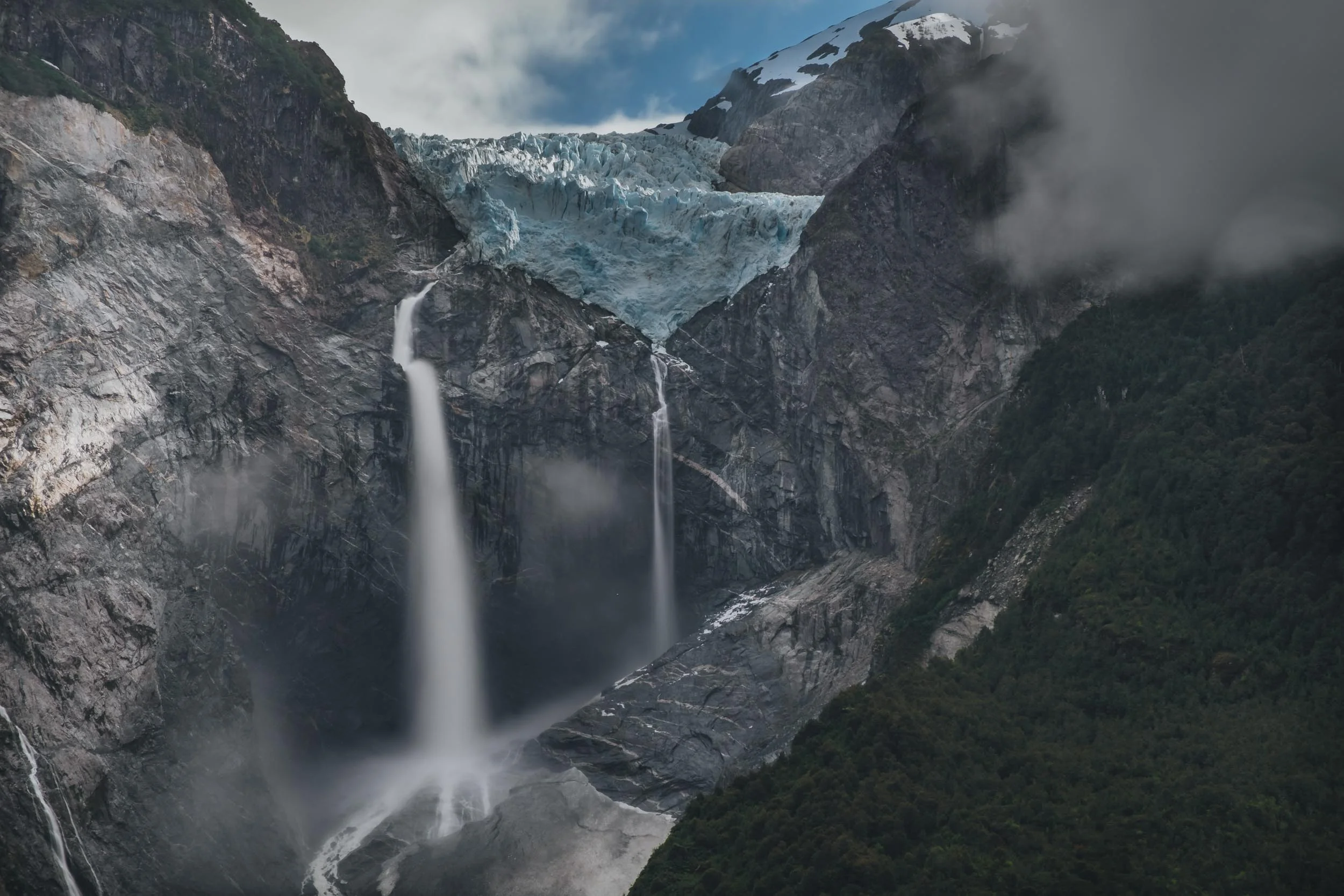 " Why we like it : Chile is home to some of planet earth's most breathtaking natural wonders and panoramic landscapes, and Javi's capture of this glacier mid-flow showcases them perfectly. The moody, stormy clouds and dark, thick forests that frame the shot give it an extra flourish of drama, and feel almost as though they are creeping into the camera lens itself." - Source — Emily Frost, Lonely Planet