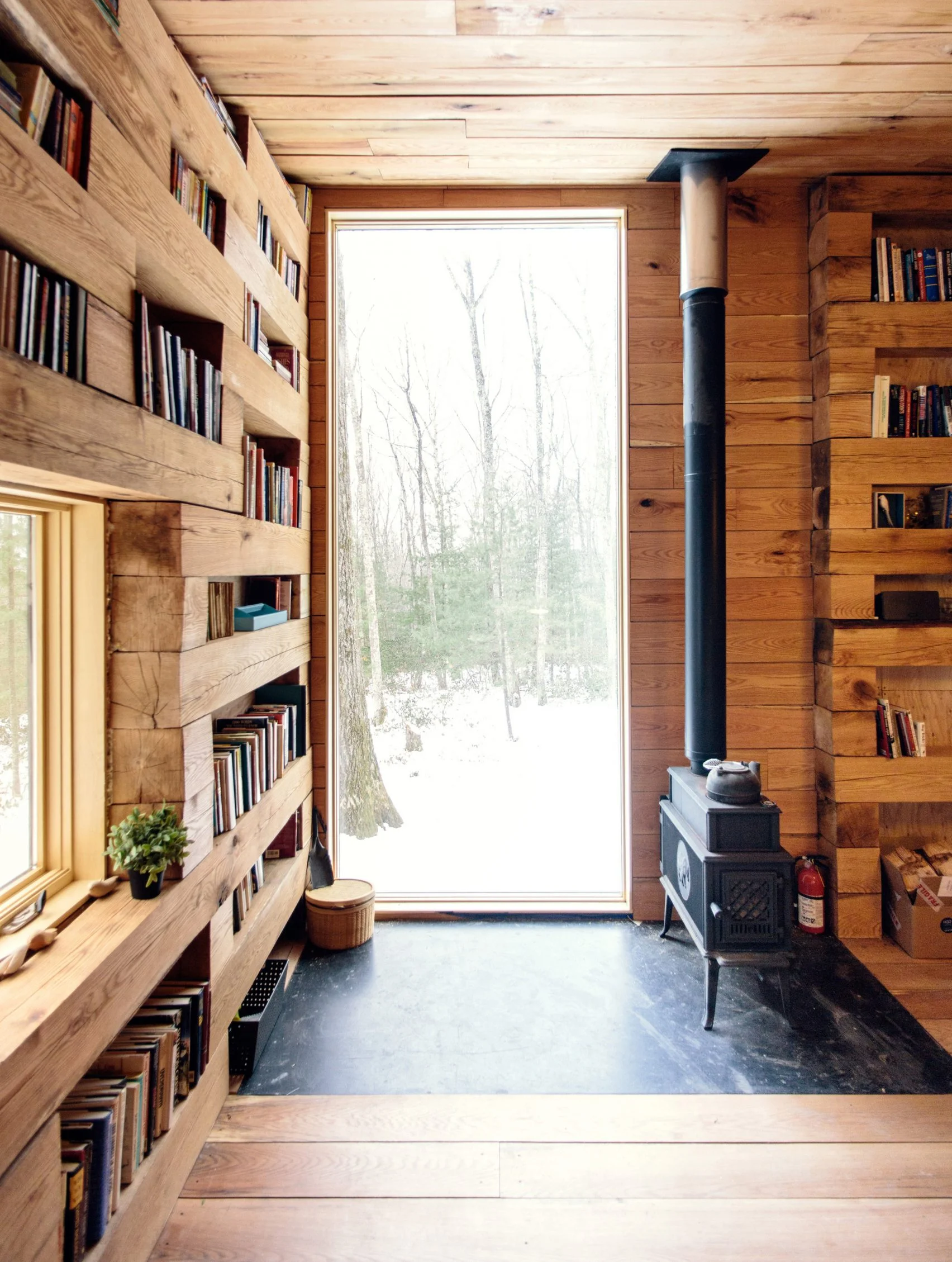 A library cabin in the woods in New York State designed by Studio Padron | photos by Jason Koxvold