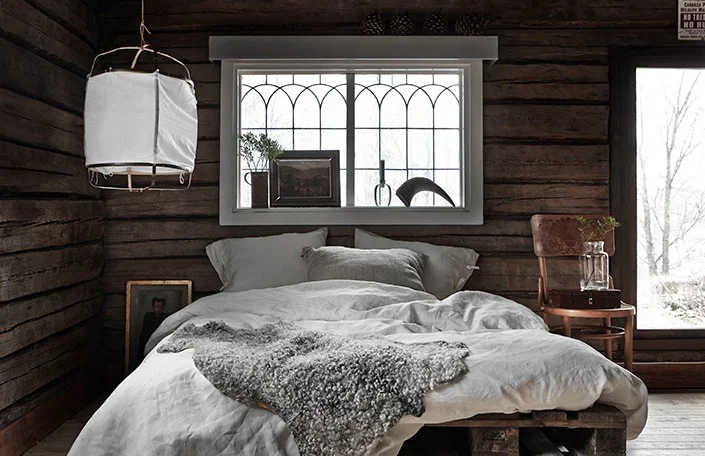 This is how you picture a cabin isn’t it? Not just wood furnishings and floors but also wooden walls. How cozy! | photos by Jonas Gustavsson