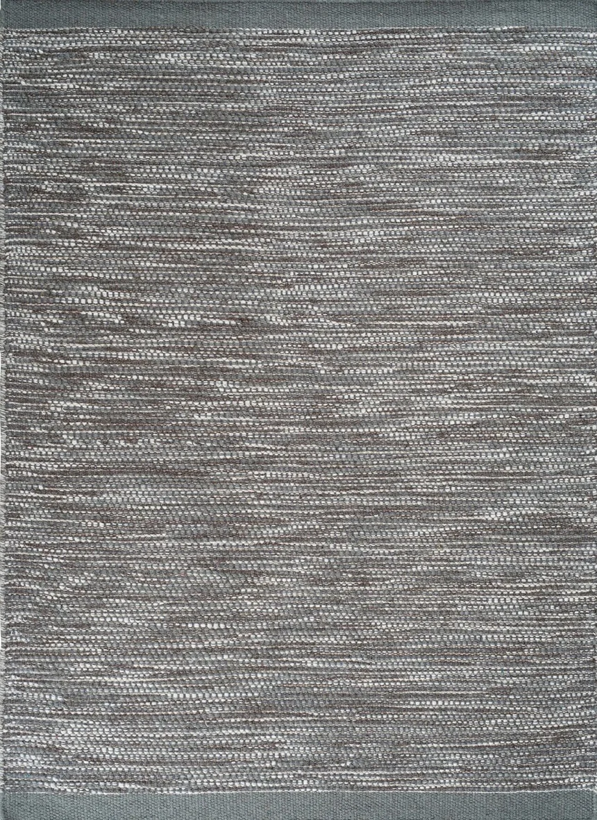 Instead of black & white you can go for a but more colour with this teal coloured rug by Linie Design - Asko Teal