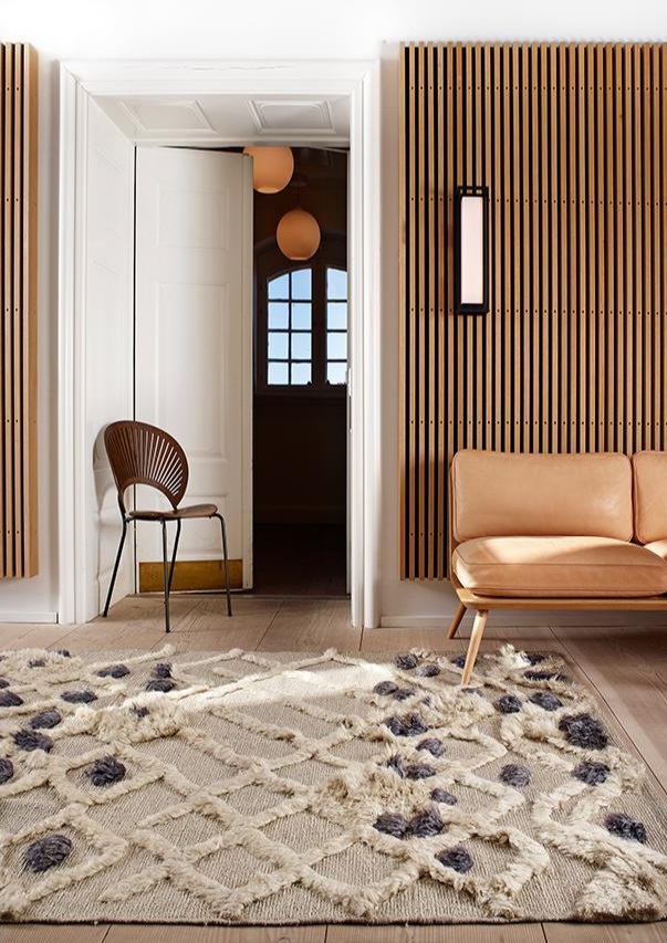 This Massimo - Bur-Bur Taupe rug is defintely an eye catcher. I just love the fluffy bits