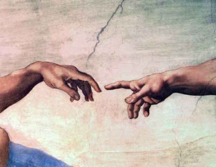 Michelangelo’s Sistine Chapel - God reaching out to mankind