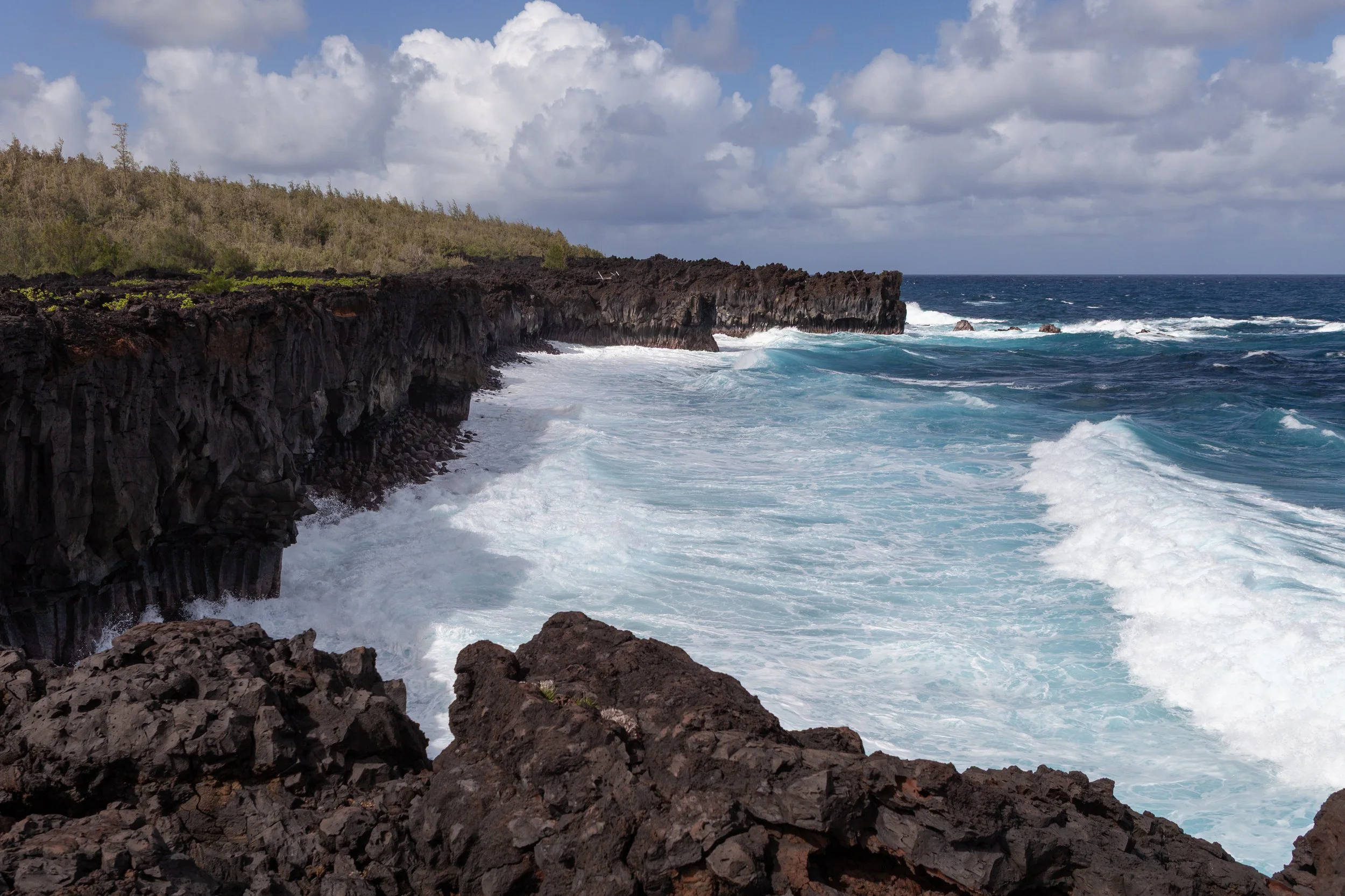 waves breaking on massive sea cliffs