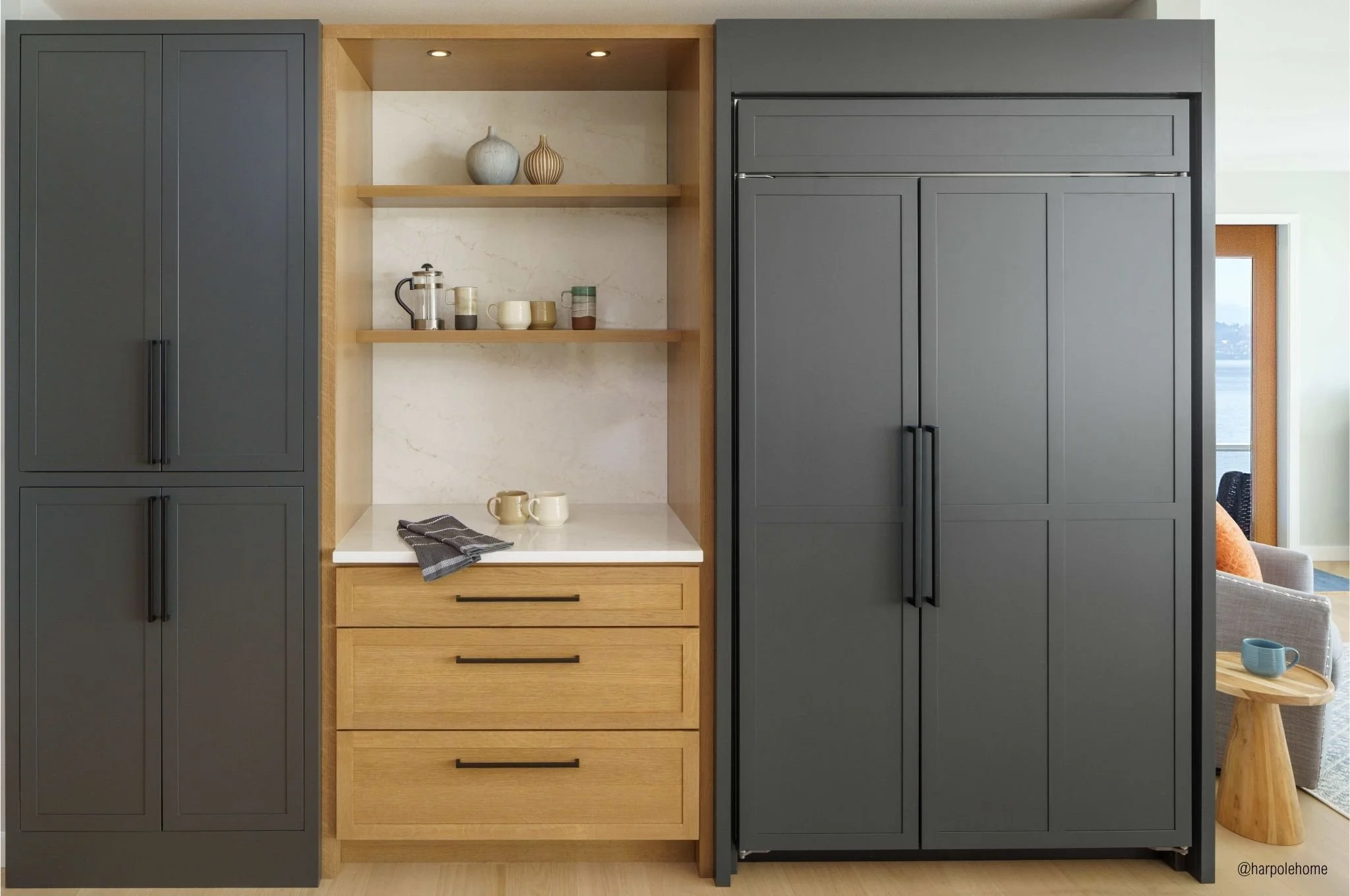 Durasupreme oak coffee nook with open shelving and panel-ready Sub-Zero refrigerator on Vashon Island kitchen remodel