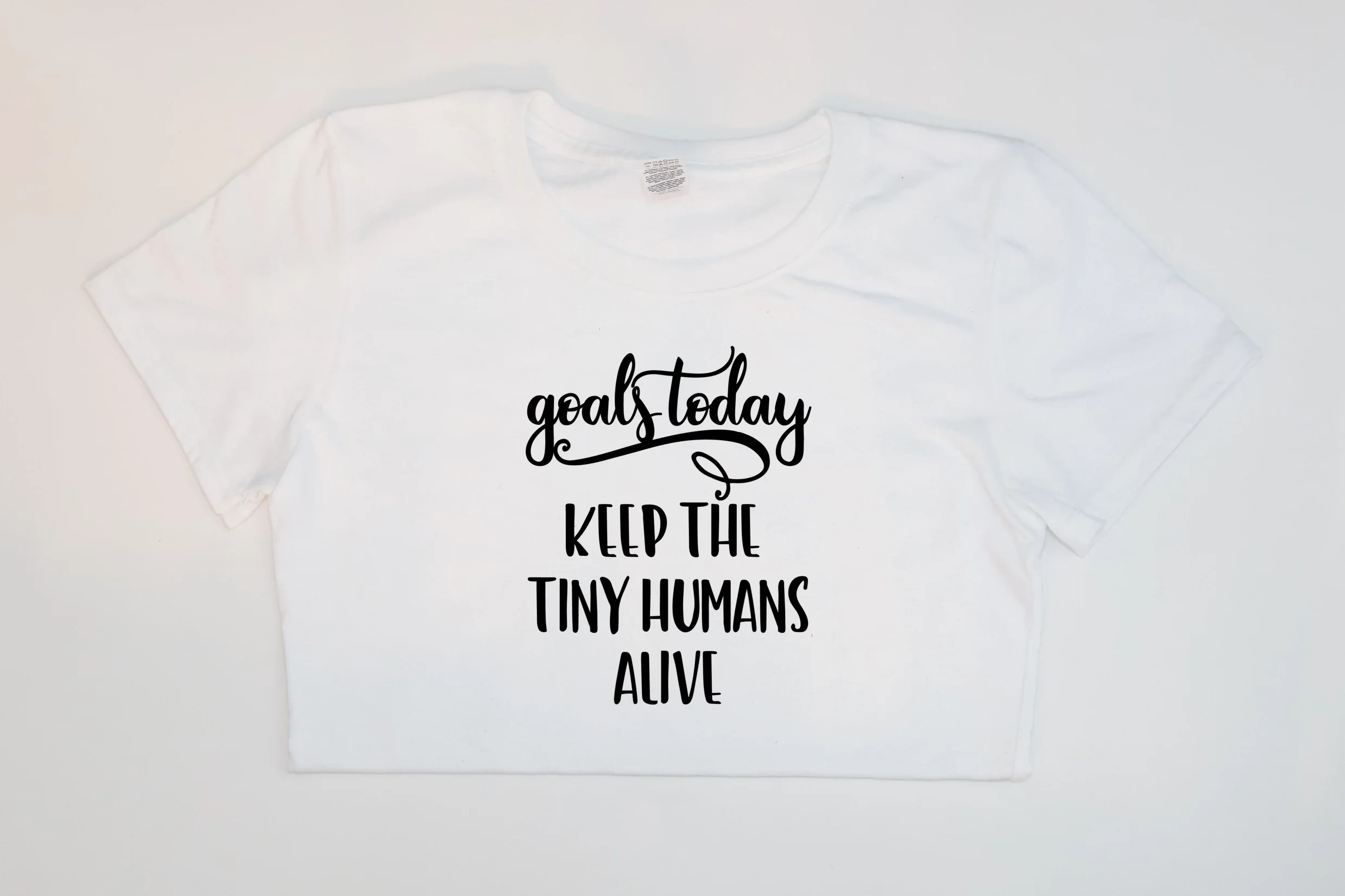 goals today keep the tiny humans alive white.jpg