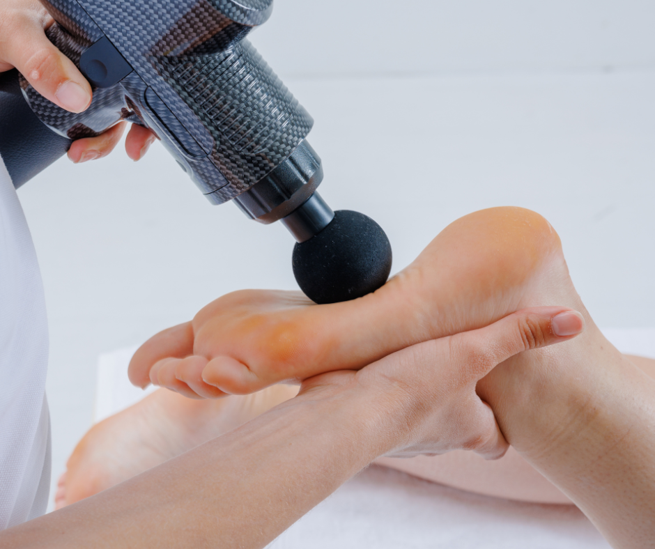 massage gun on foot