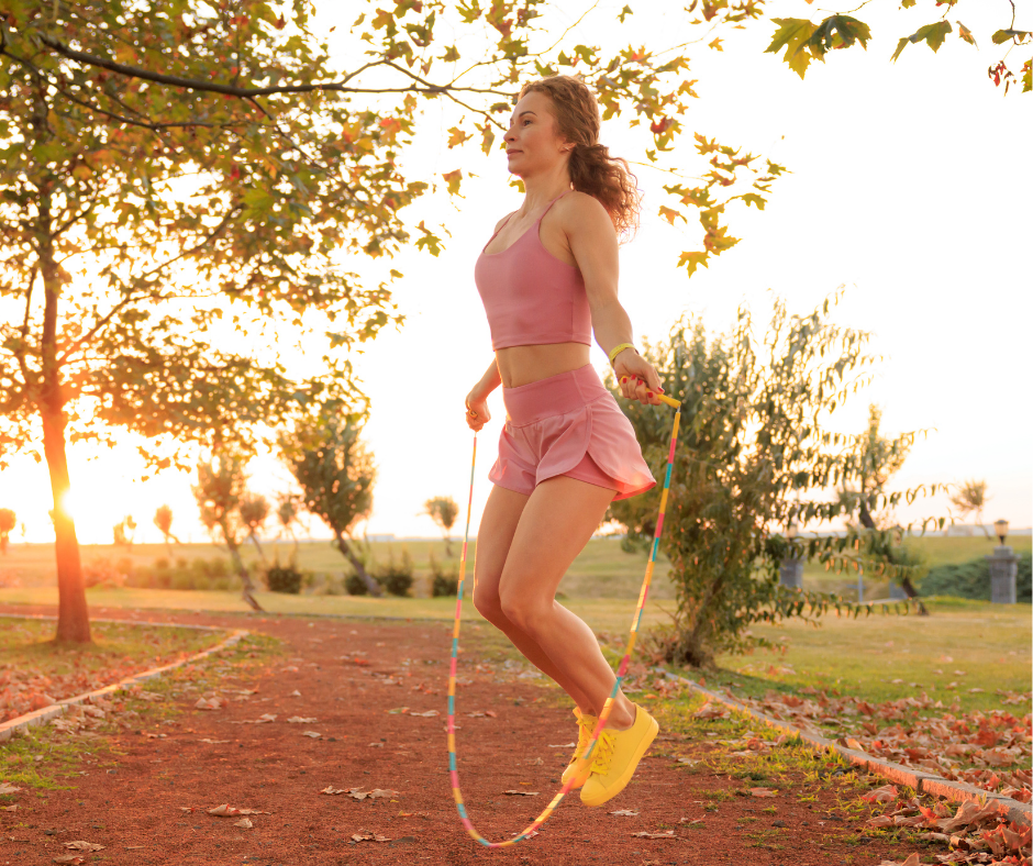 woman jumping rope outdoors