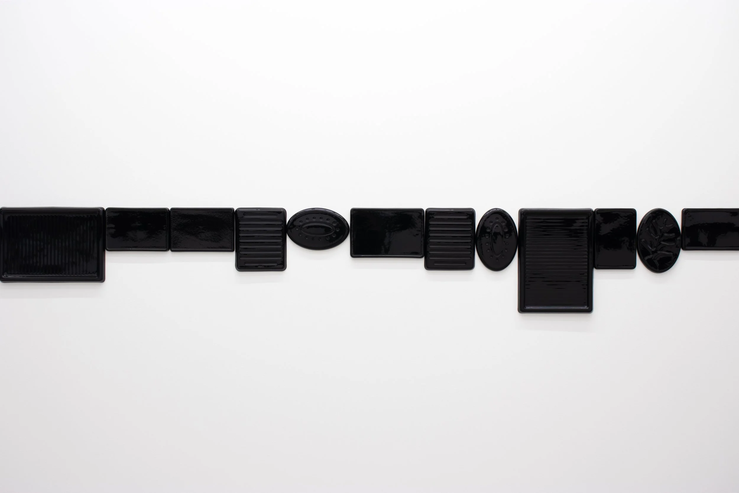  Michelle Grabner   Untitled , 2026  glazed porcelain  19h in x variable 