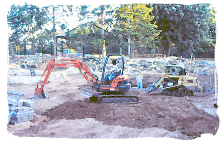 Grading and leveling for boulders and water.