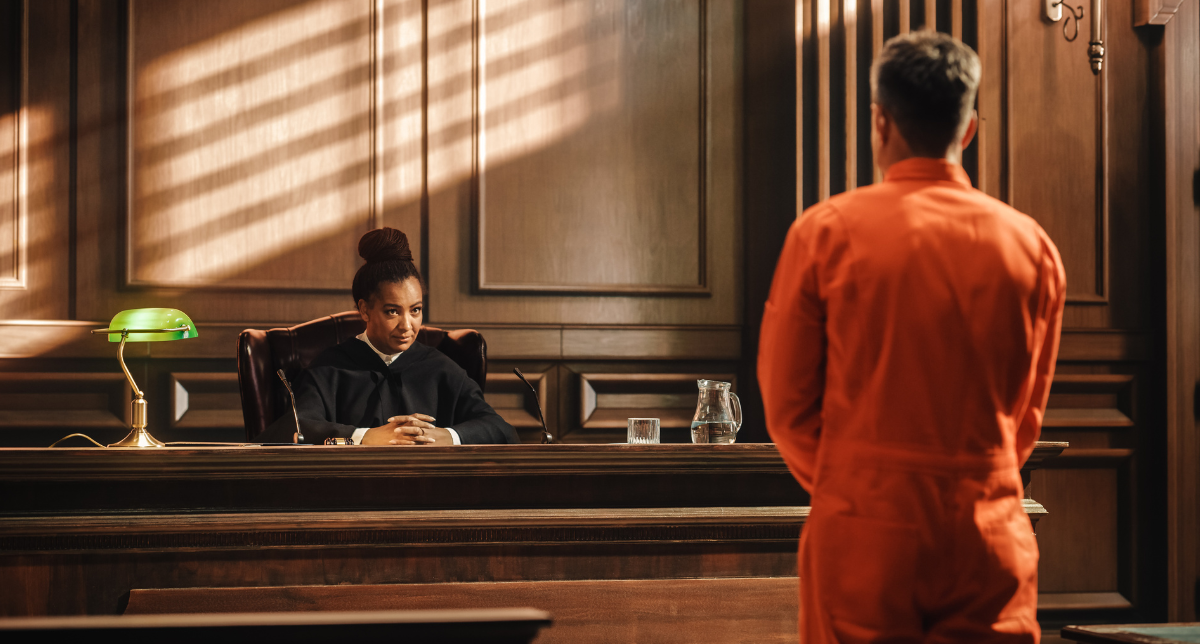 Defendant facing a judge in court