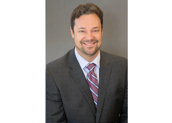 Chris Laug is promoted to partner at Bessolo Haworth in 2018.