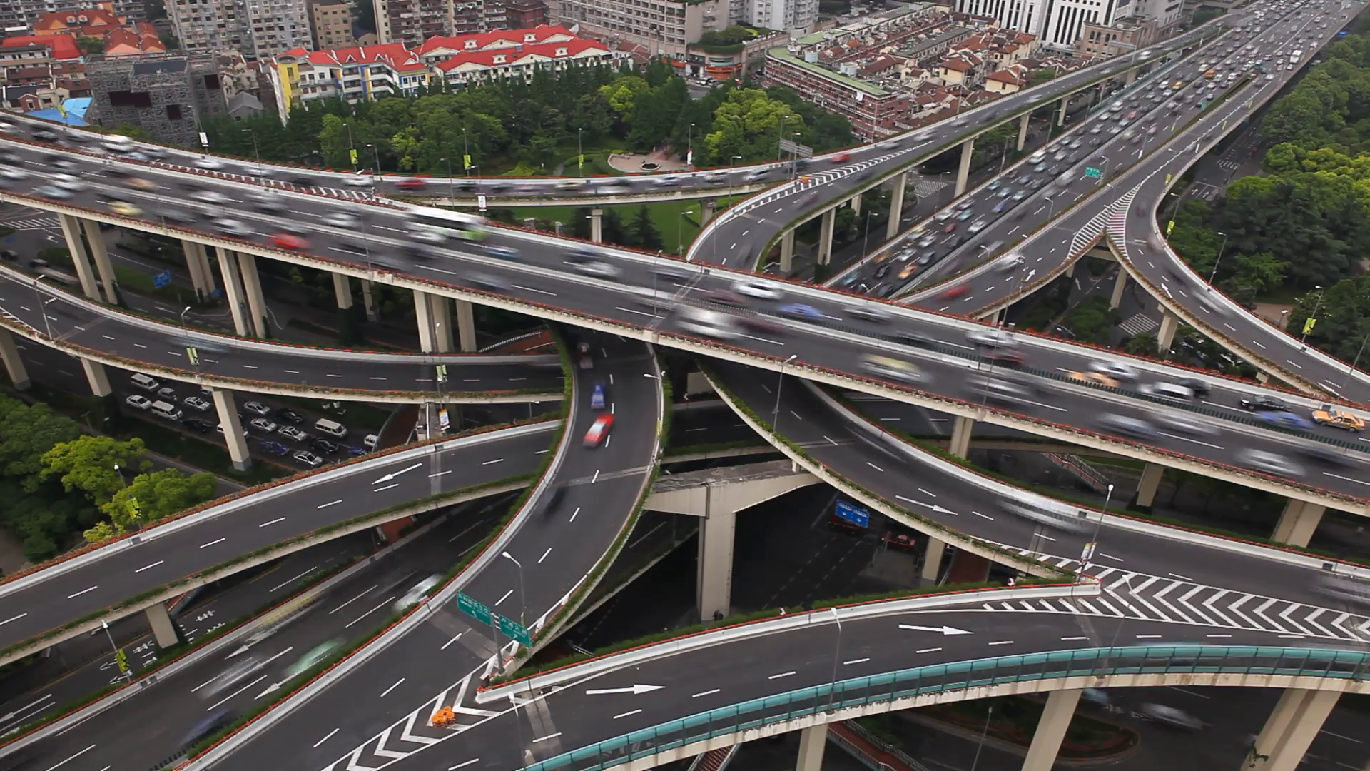 aerial-freeway-busy-city-rush-hour-heavy-traffic-jam-highway-shanghai-timelapse_rtkvmhre__F0000.png