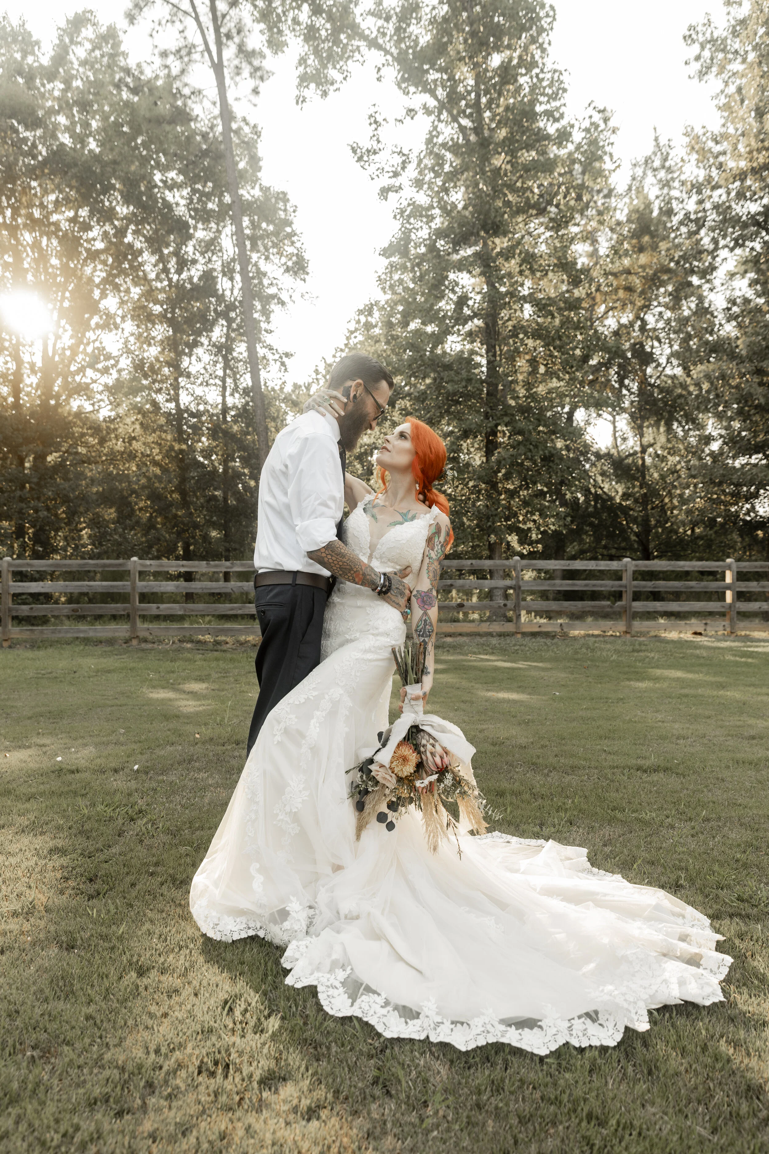 Wedding Photographer: EE Photog // Venue: Heartwood Acres // Bridal Gown: Atlanta Street Bridal Company // Hair & Makeup: Make-up by Carlyn // Cake: CakeDacious // Invites: Tiger Lily Invitations // Wooden Signage + Vow Books: Mission Heart Designs // Floral Designer: Your Best Guest Weddings and Events // Decor: Your Best Guest Weddings and Events // Jewelry & Non-Bridal Clothing: Dani Rae & Co . // Wedding Bands, Hair Piece, Garter: Amazon // Bride & Groom: Amy and Ross Langwa