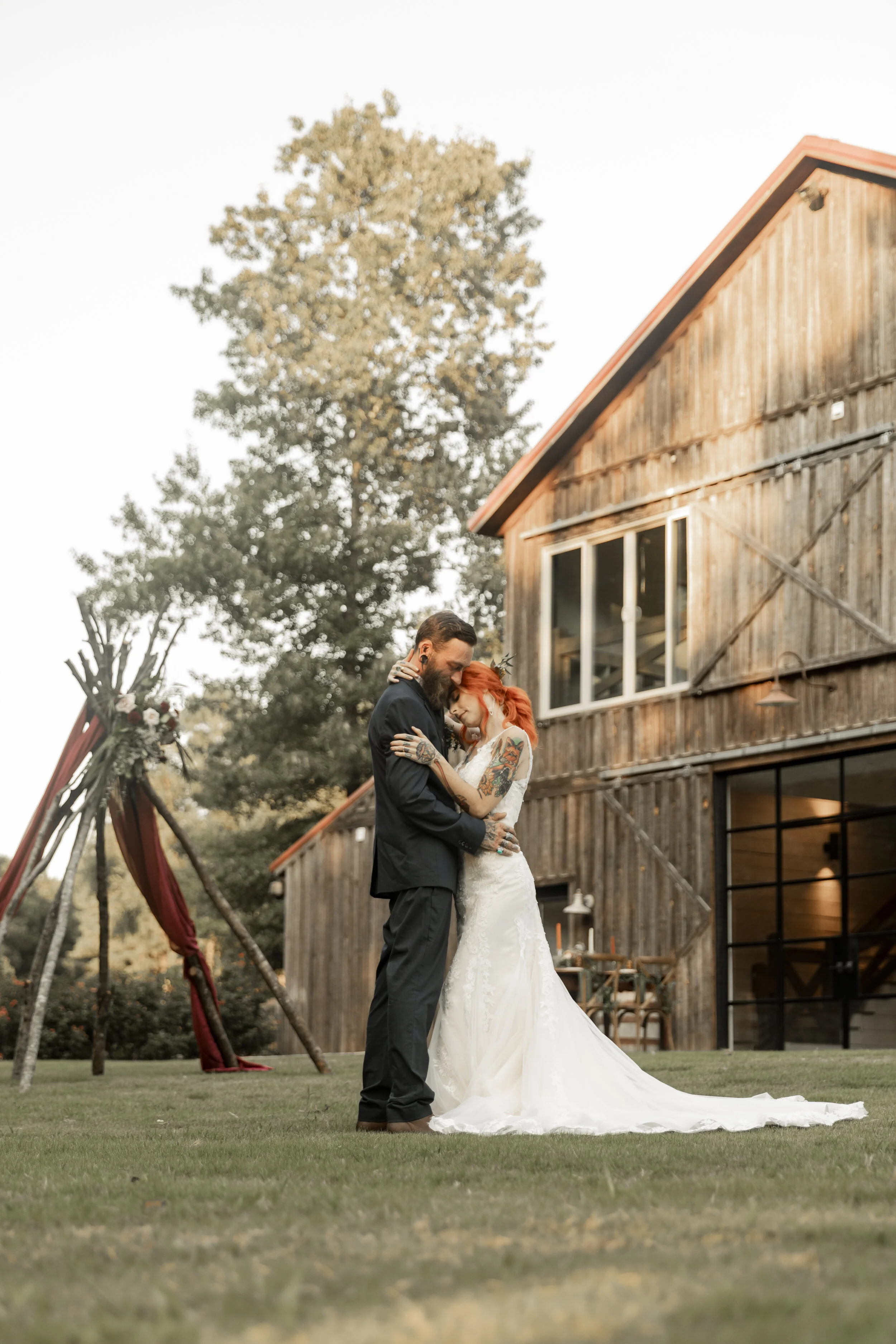 Wedding Photographer: EE Photog // Venue: Heartwood Acres // Bridal Gown: Atlanta Street Bridal Company // Hair & Makeup: Make-up by Carlyn // Cake: CakeDacious // Invites: Tiger Lily Invitations // Wooden Signage + Vow Books: Mission Heart Designs // Floral Designer: Your Best Guest Weddings and Events // Decor: Your Best Guest Weddings and Events // Jewelry & Non-Bridal Clothing: Dani Rae & Co . // Wedding Bands, Hair Piece, Garter: Amazon // Bride & Groom: Amy and Ross Langwa