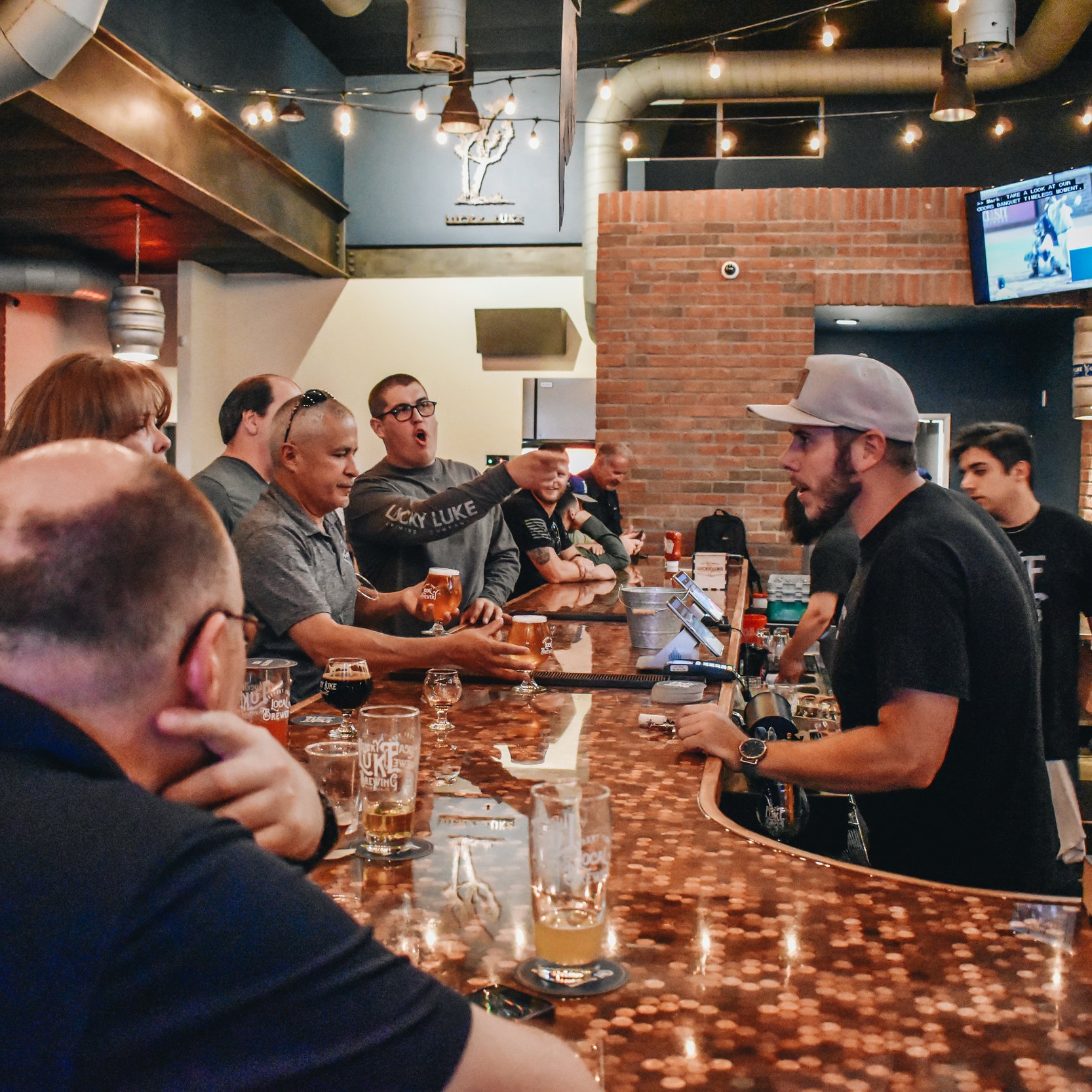  Team members Braden and Jose pouring up fresh Lucky Luke beer for our awesome guests  