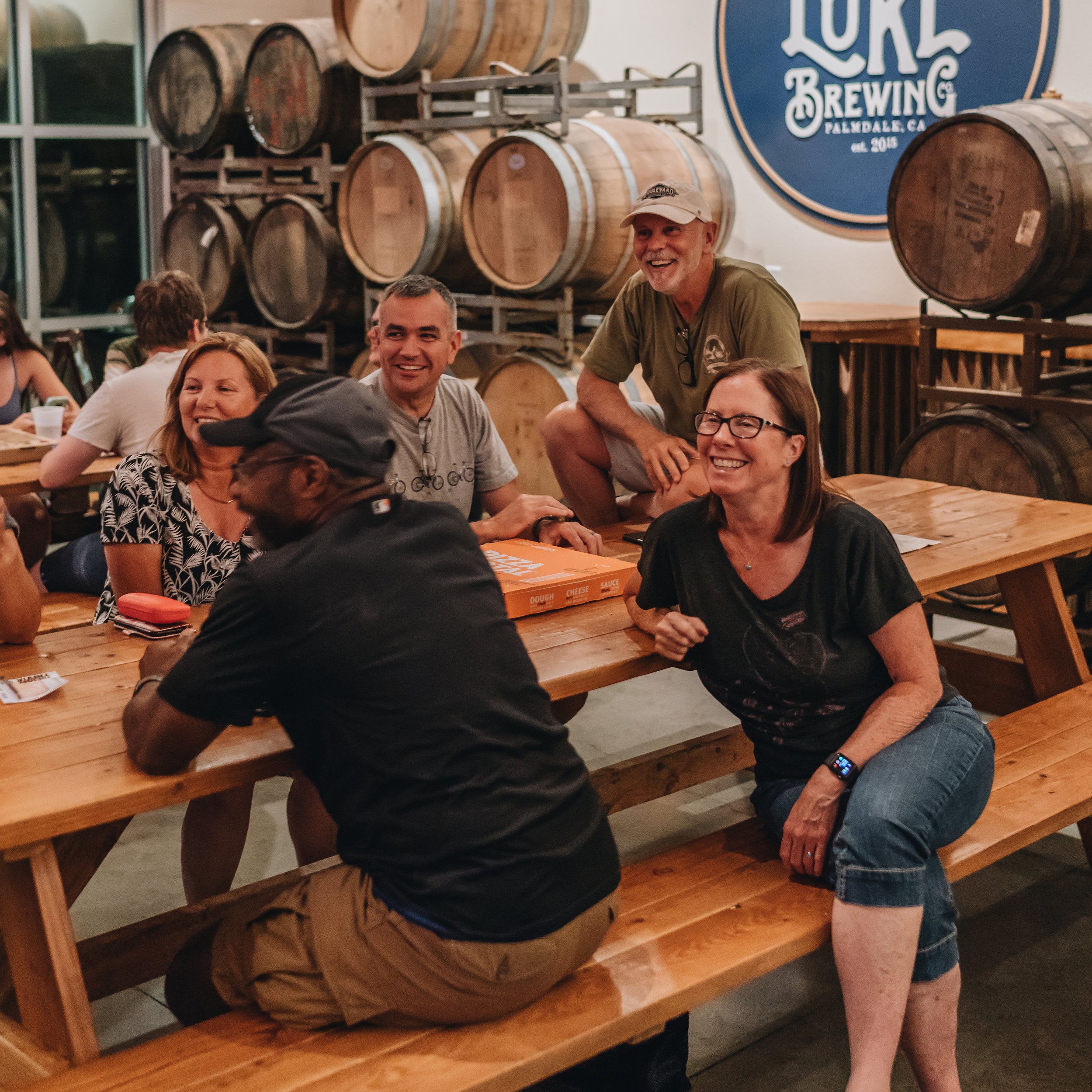  our guests sharing smiles at the Lucky Luke Taproom 