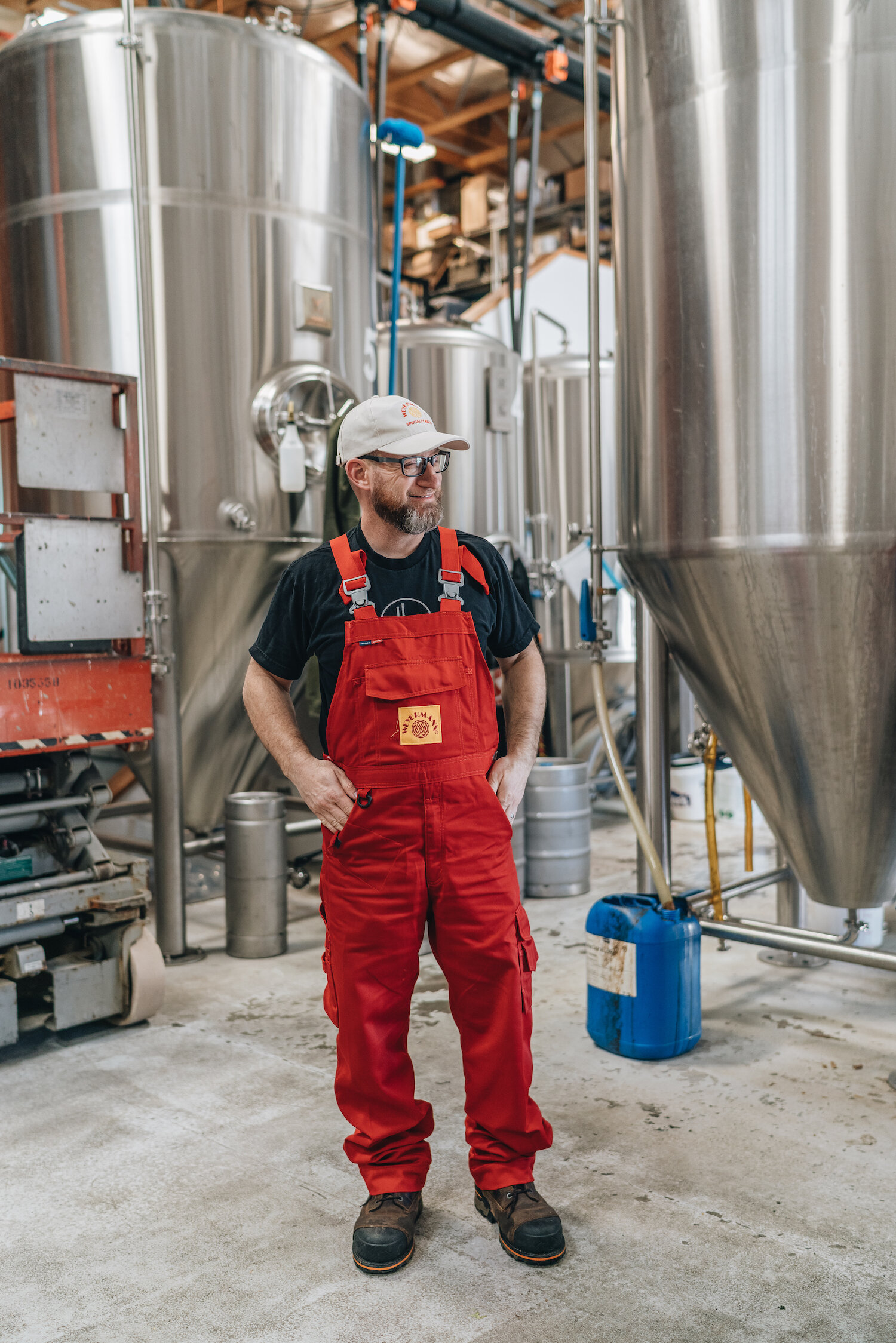  Owner Brian Schmitz sporting bright red overalls for a day of brewing fresh batches of Lucky Luke beer 