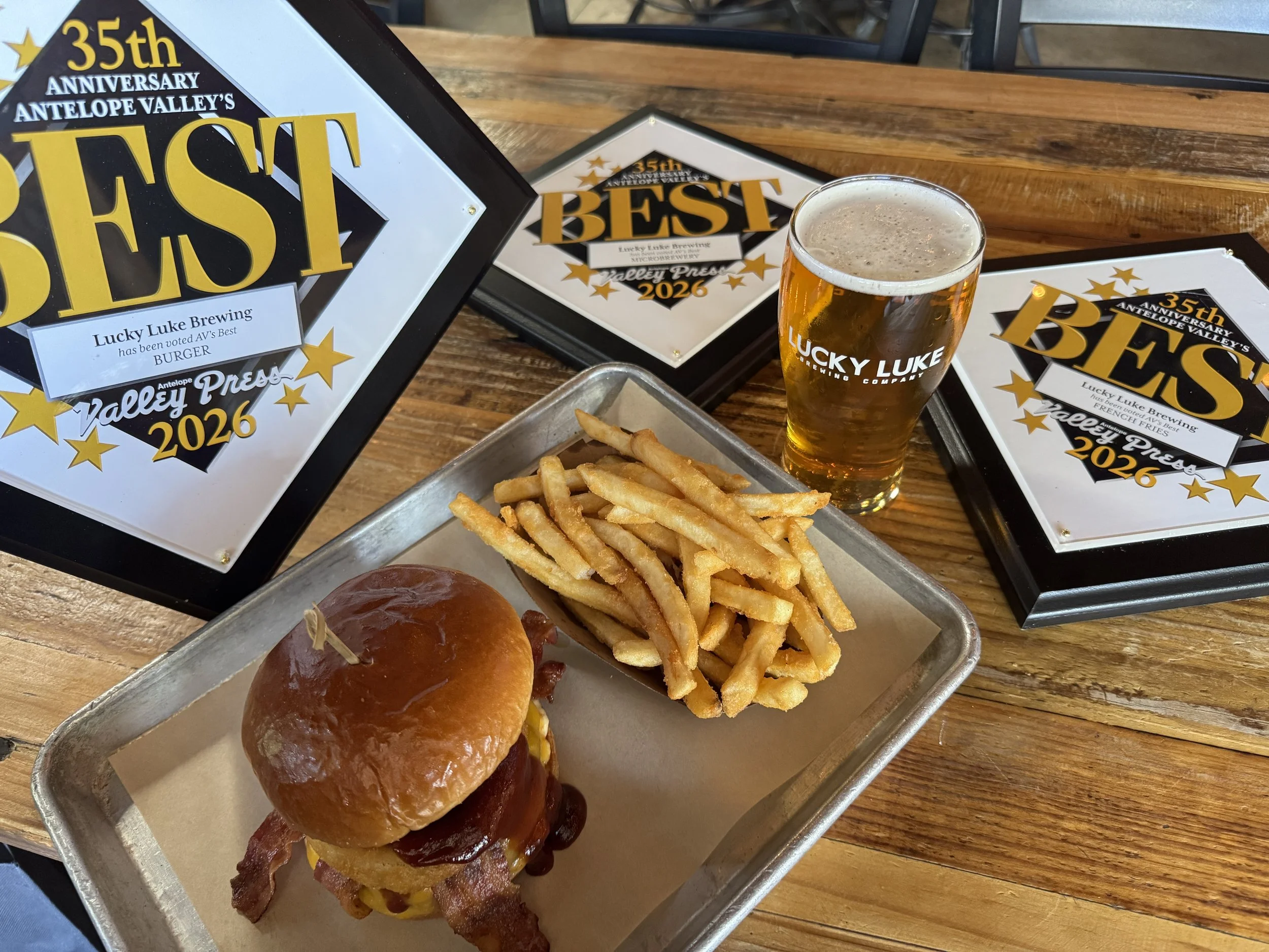 Burger, fries, and beer with all 3 of our AV's bets awards