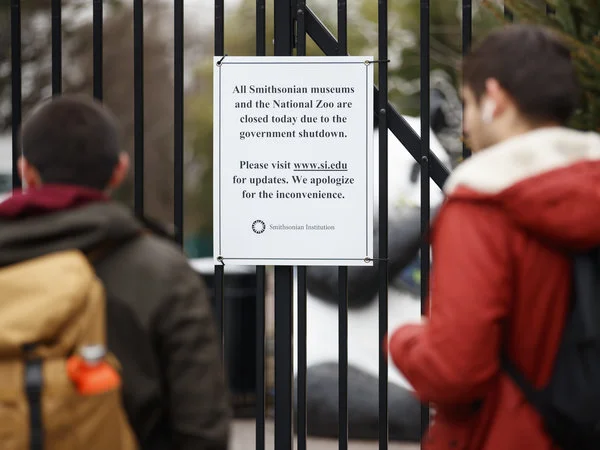 A sign posted outside the National Zoo earlier this month declares its closure, along with the closure of all Smithsonian museums. They were all on the wish list for Jill Rorem, whose family plans were undone by the shutdown. But she's not alone: The shutdown's ramifications on the arts have been felt far beyond the Beltway. Carolyn Kaster/AP