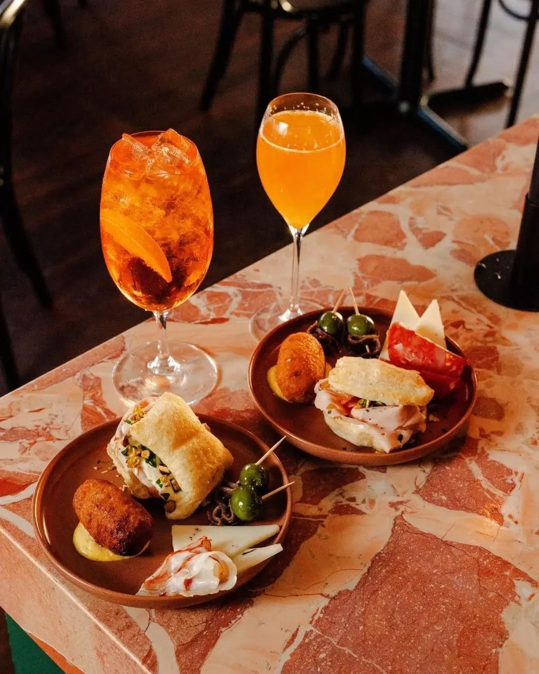 Small bites. Big vibes. Aperitivo hour is officially underway&nbsp;🍹 

Friday &amp; Saturday 4pm-6pm | $10 Spritz, Negroni &amp; Americano + more | Book via link in bio