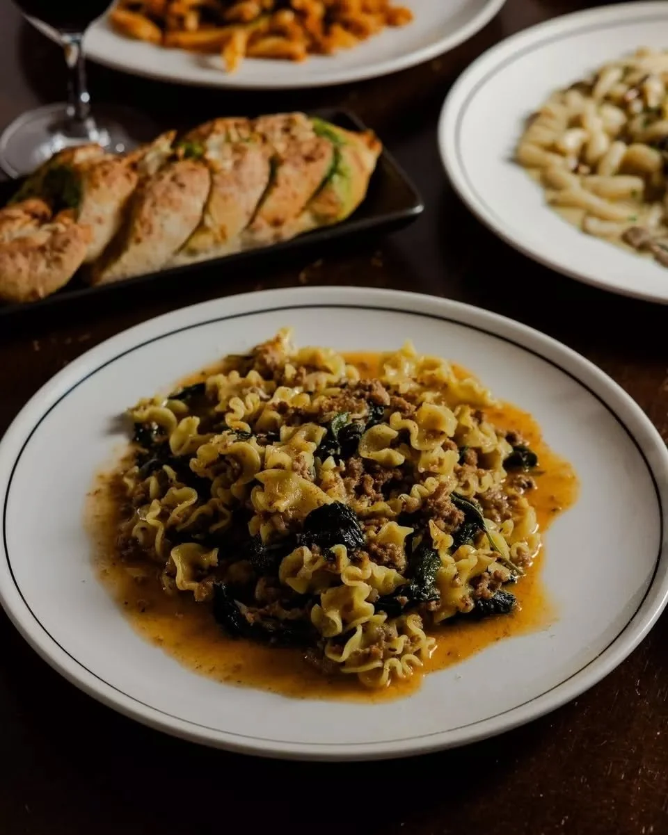 Comfort food, the Italian way. 

Homemade mafalde with white duck rag&ugrave;, black kale and sage.