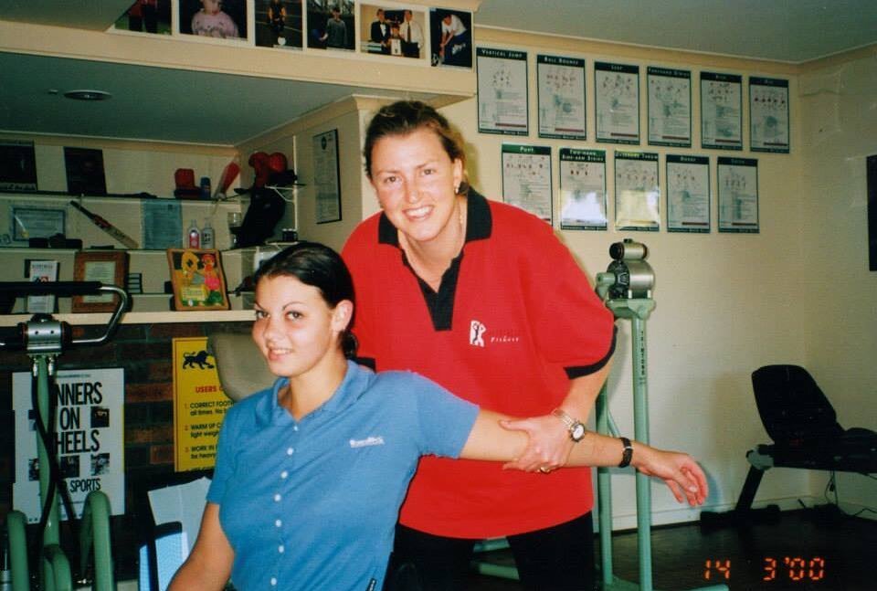 Amanda &amp; Julienne, 2000.

〰️

[Image description: Julienne gently stretches Amanda&rsquo;s pectorals as part of a mobility warm-up before Amanda&rsquo;s Heartwell session. Both are smiling.]

#heartwellfitness #ndis #accessibility