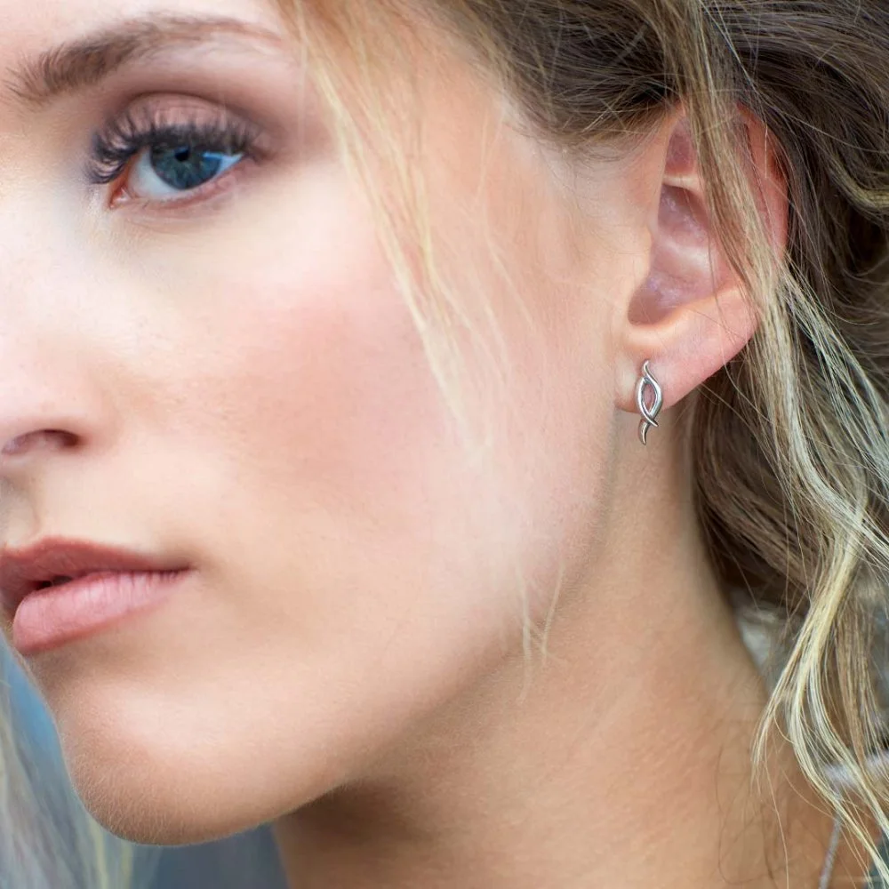 Model_wears_Entwine_Twine_Twist_Statement_Stud_Earrings.jpg