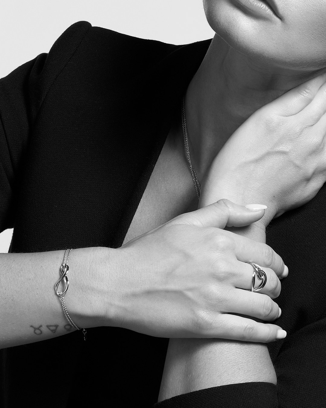 Model_wears_Infinity_Twin_Chain_Bracelet_2.jpg