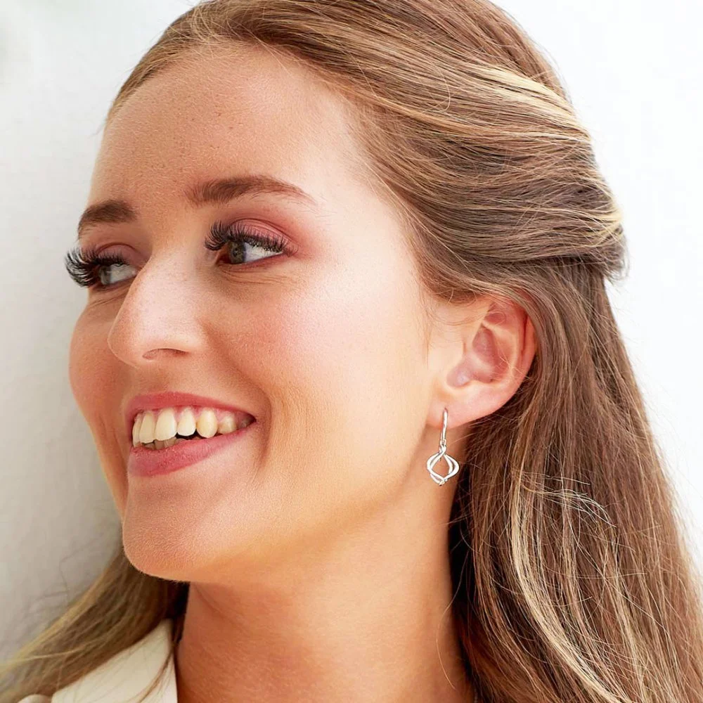 Model_wears_Alicia_Petite_Drop_Earrings.jpg