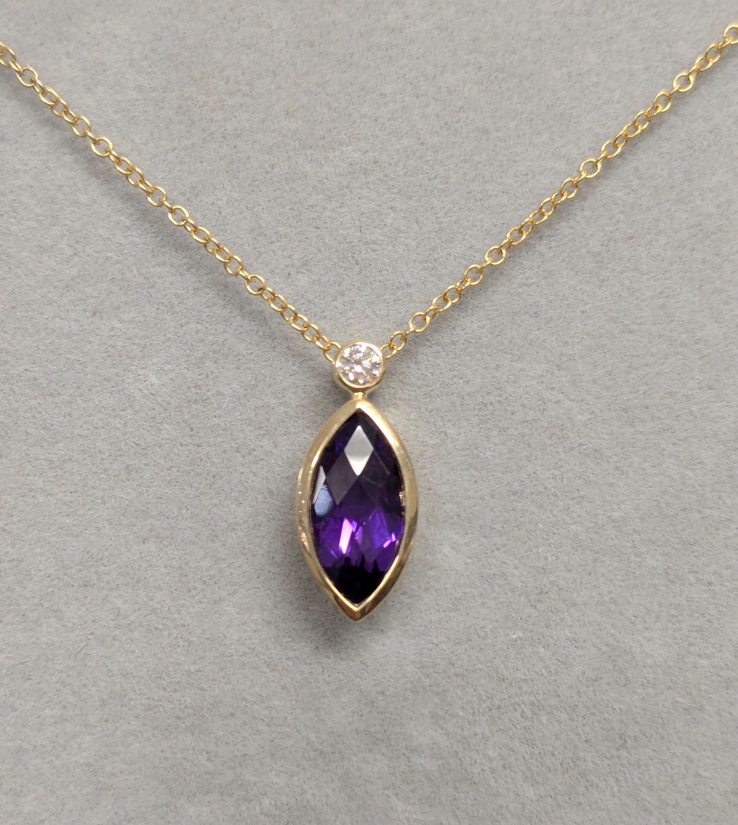 2Z53YDAM 9ct Yellow Gold, Marquise Amethyst and Diamond Pendant and chain