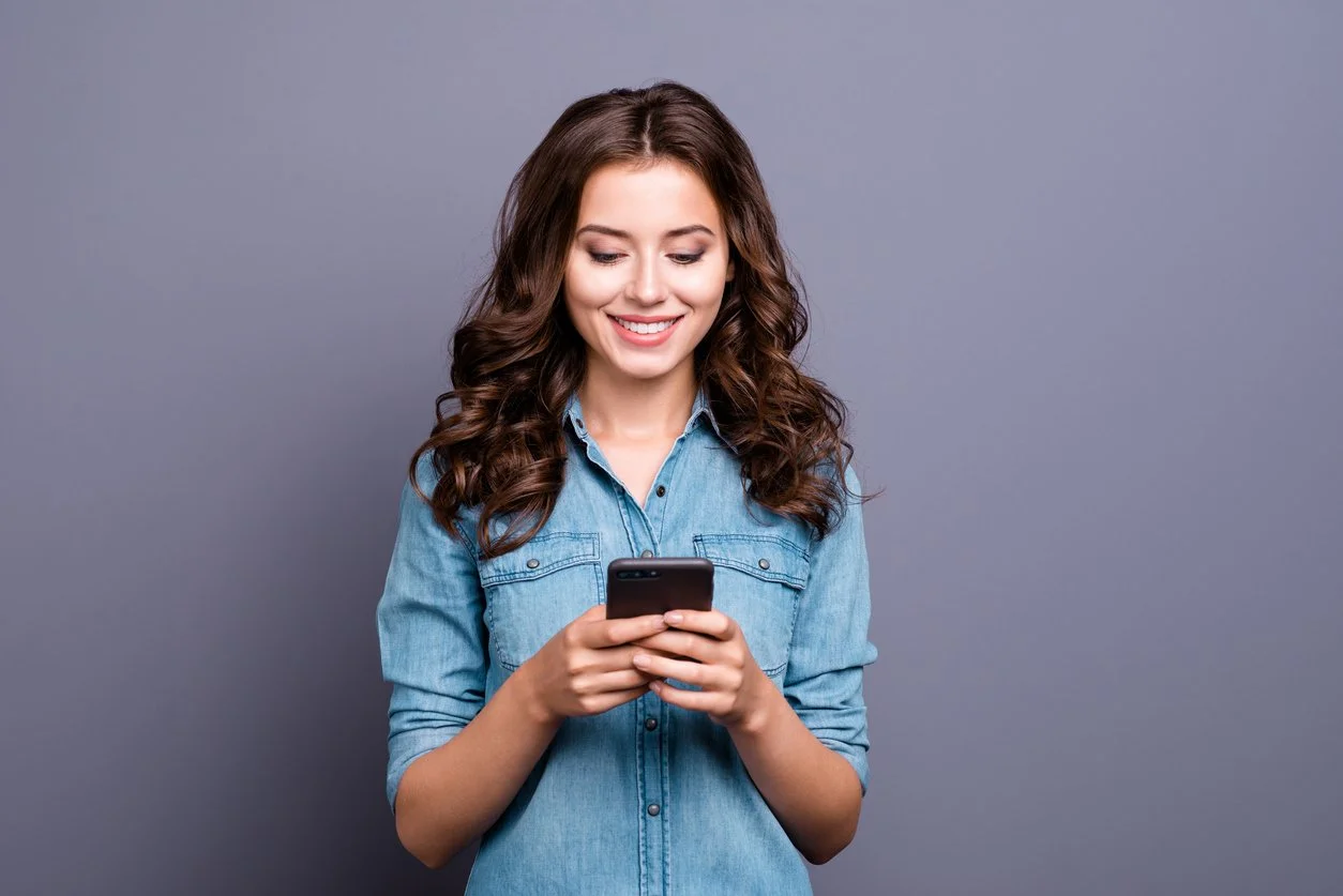 Girl accessing online period delay treatment with GP24