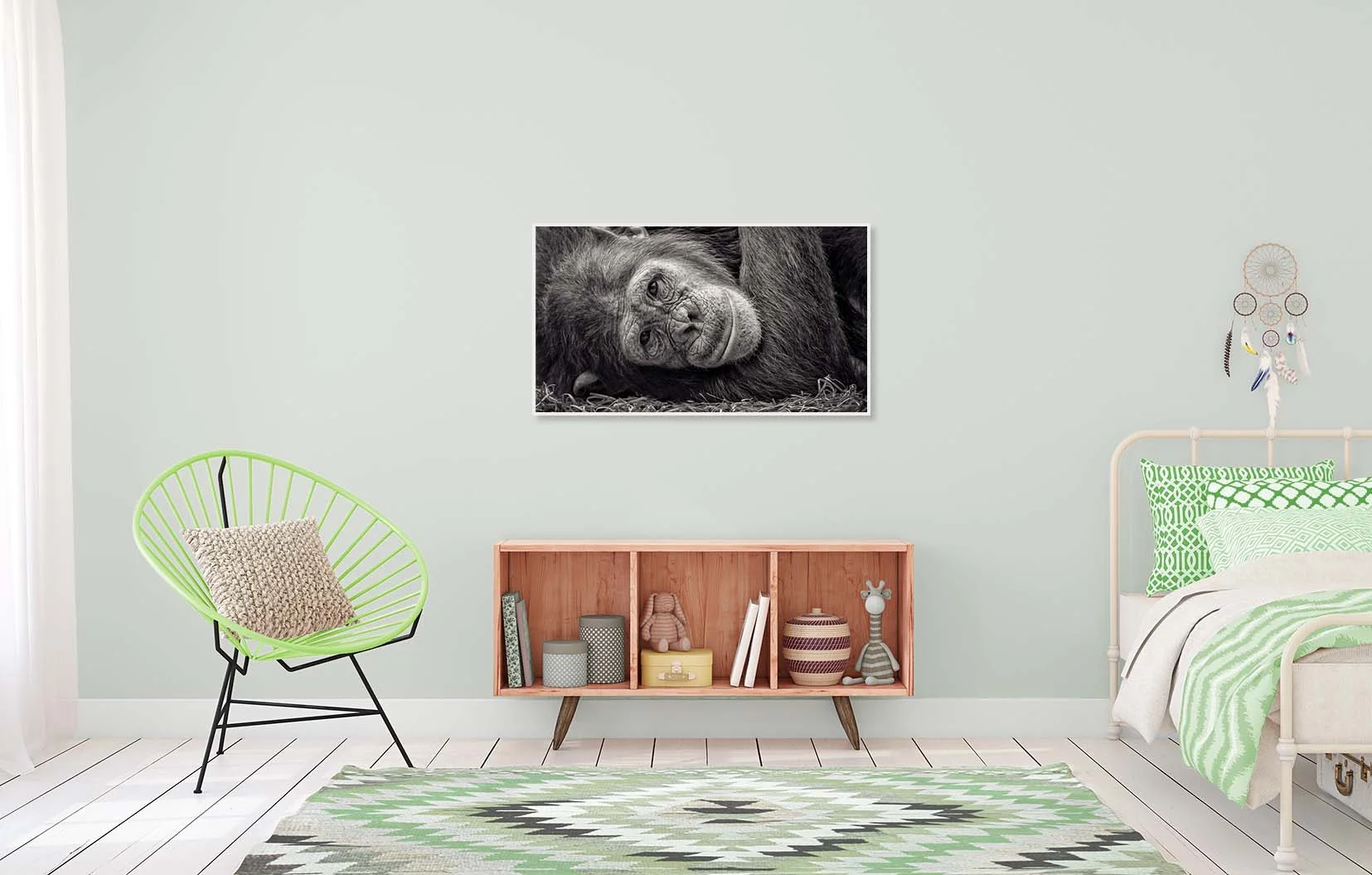 Black and white portrait of a chimp at rest, shown in a child’s bedroom. Limited edition photographic print by fine art photographer Paul Coghlin.