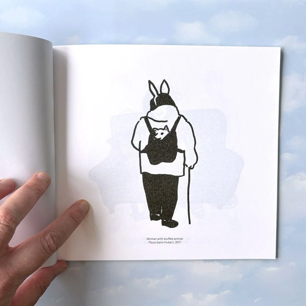 Woman with stuffed animal. Plaza Saint-Hubert, 2017