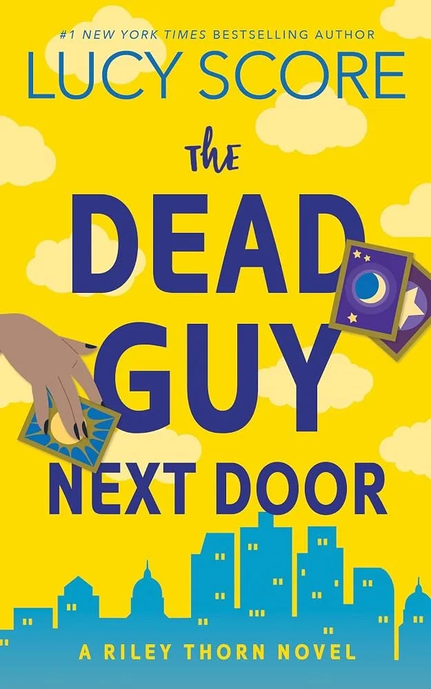 The Dead Guy Next Door by Lucy Score