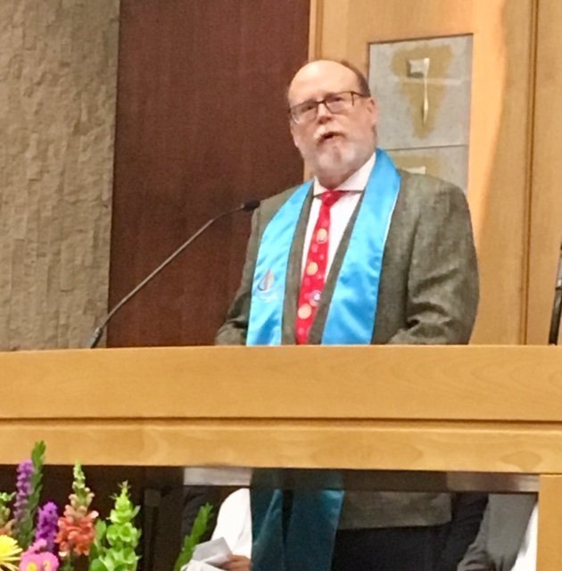 Leading prayer at Synagogue  