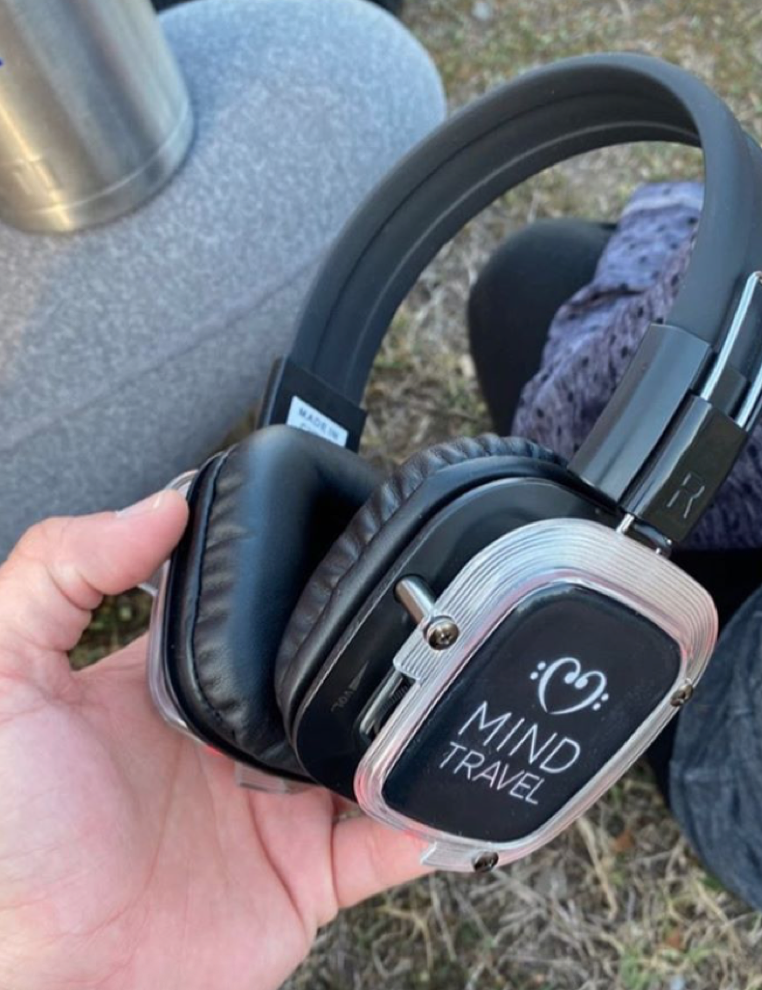 Austenite and wellness guru Paige Booth snaps a quick photo of her headsets as she patiently waits on the lawn for Murray Hidary to perform his on-the-spot piano composition. [Courtesy of Paige Booth]