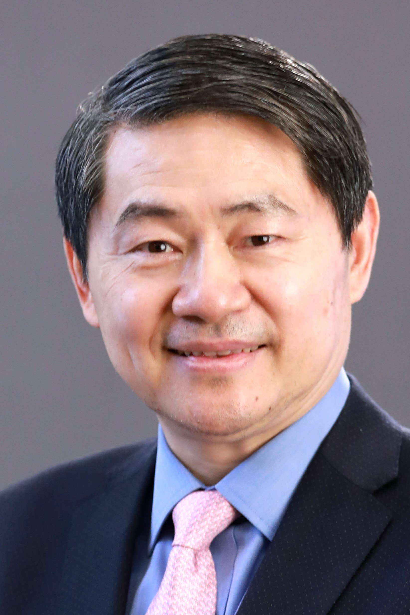 Dr. Henry Huiyao Wang