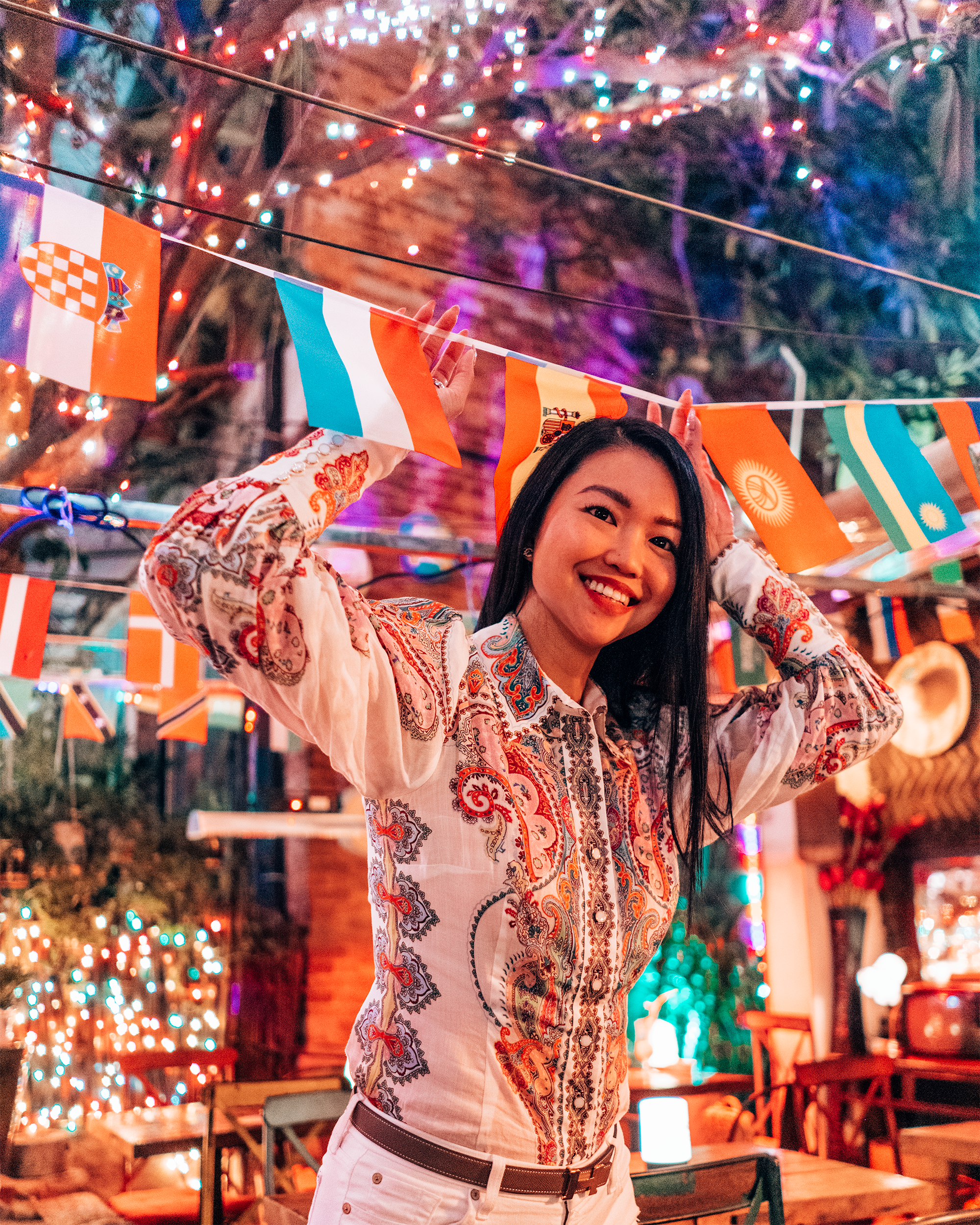 Reveling amidst neon lights in Rambler, a traveler’s bar tucked away in Tianzifang.