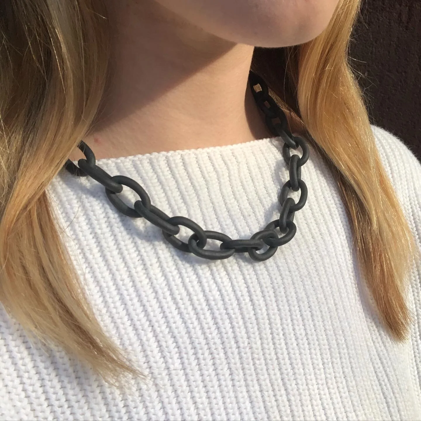 Black porcelain chain link necklace on model 2.jpeg
