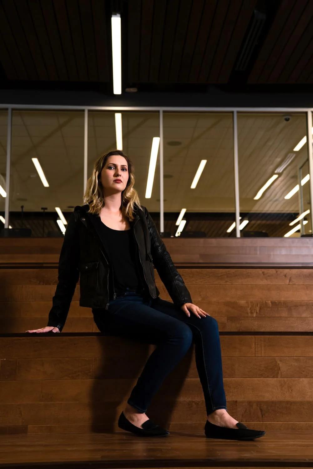 student sitting on steps
