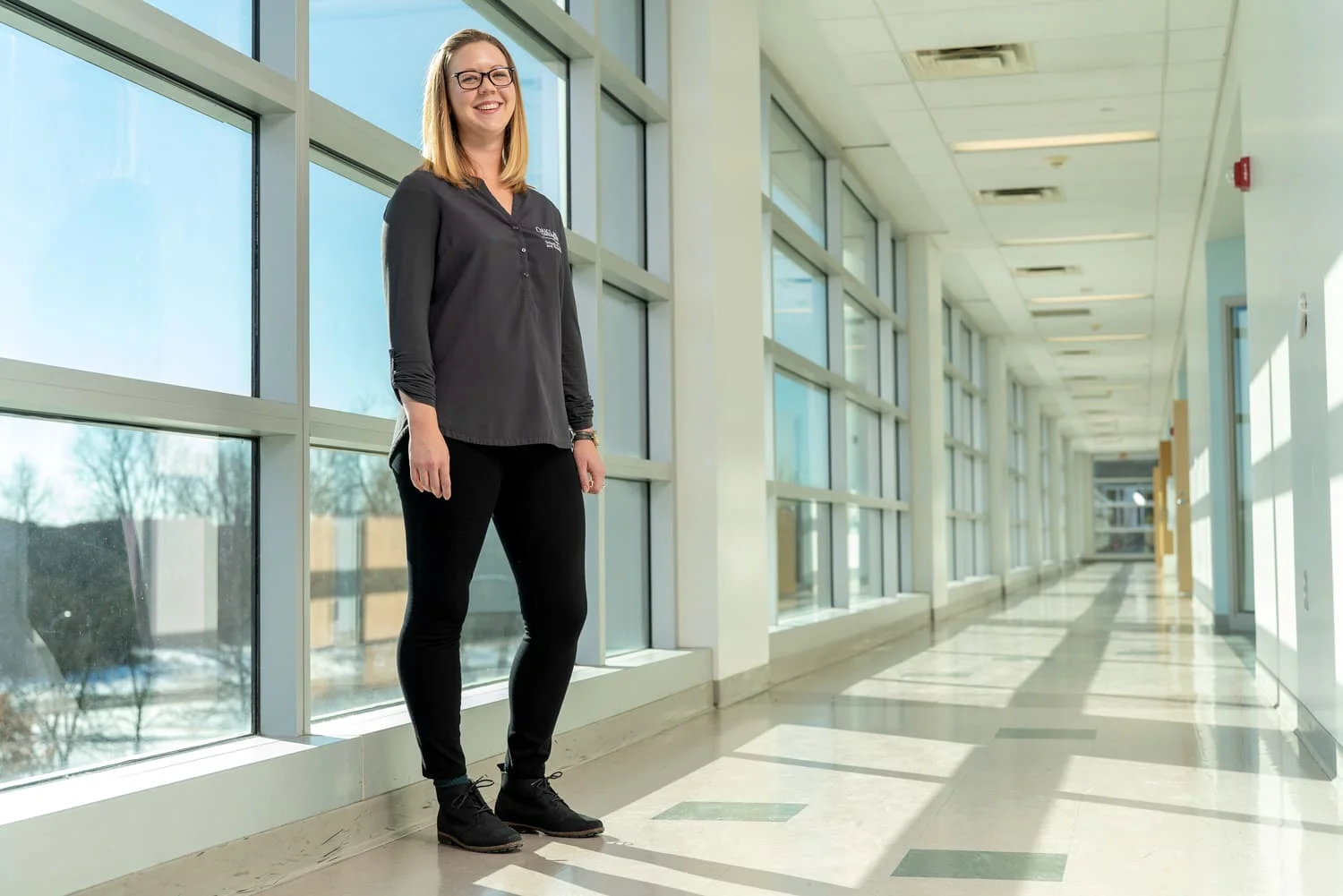OU Staff standing in hallway