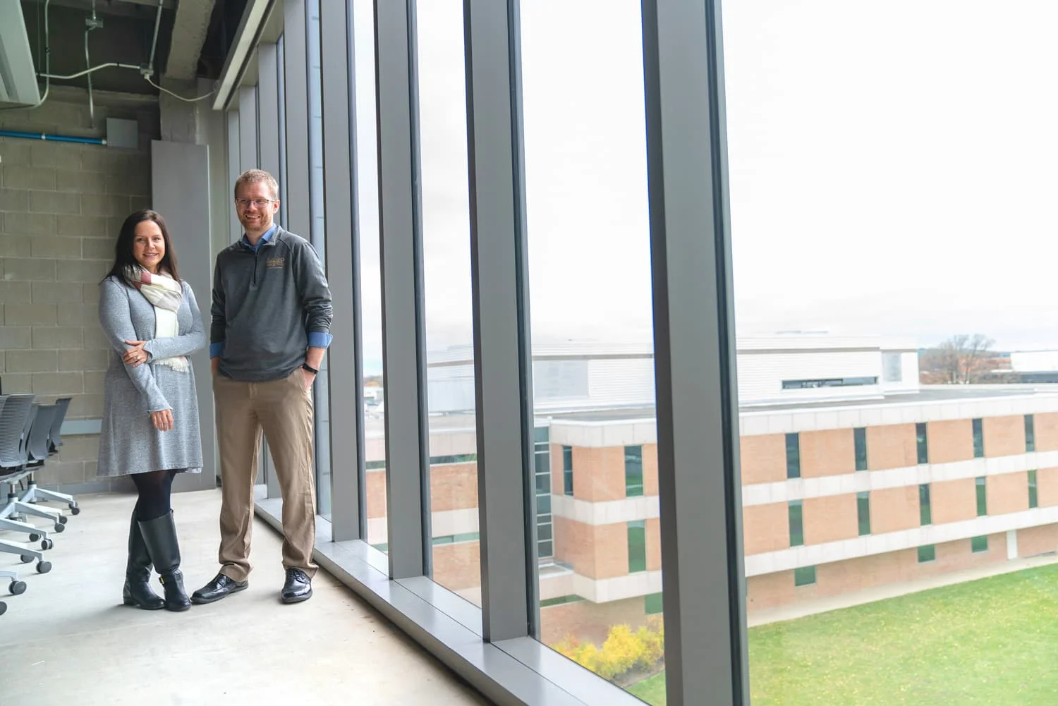 Editorial photography of two colleagues in computer lab